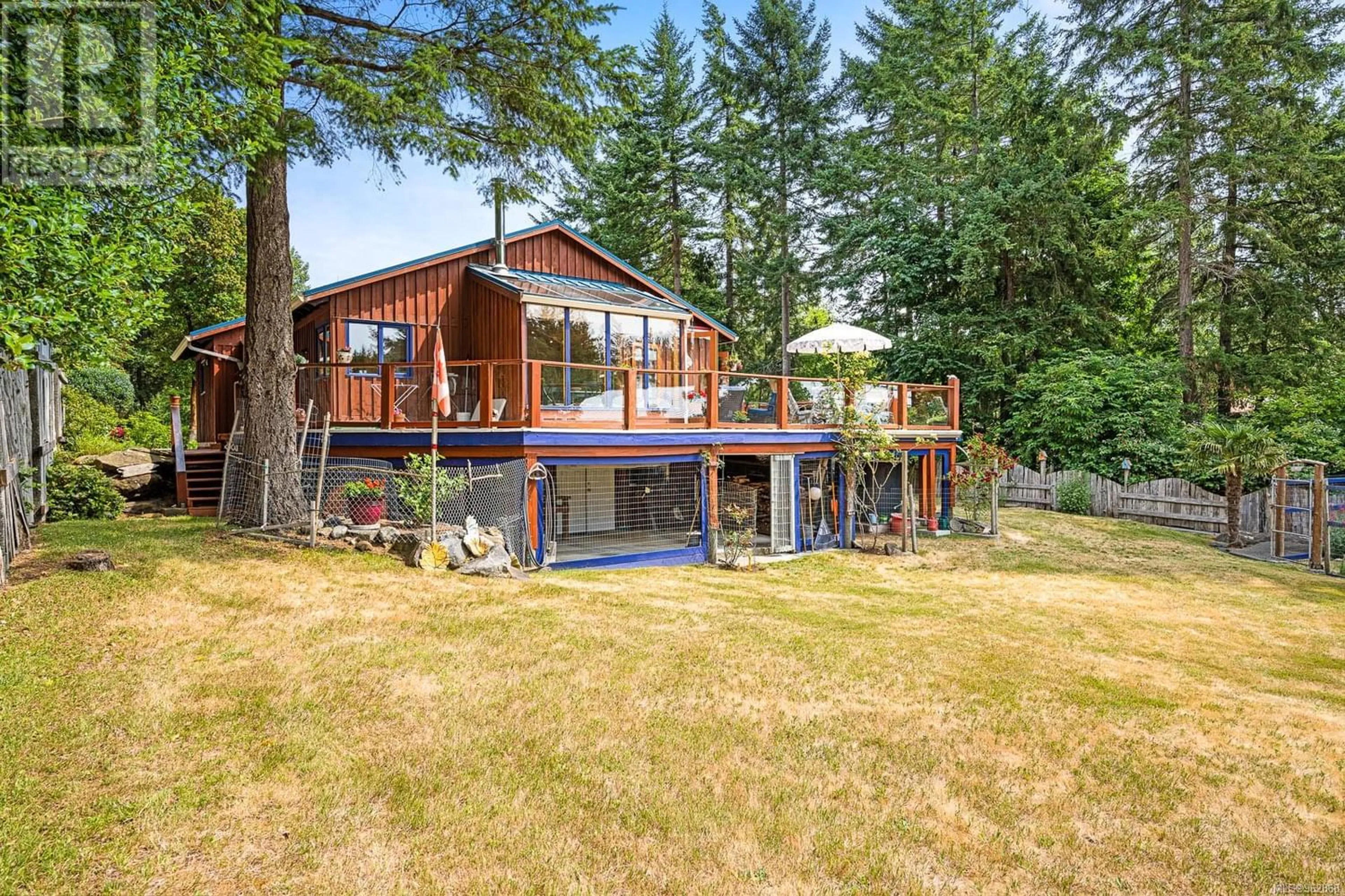 Frontside or backside of a home for 5270 McLeod Rd, Hornby Island British Columbia V0R1Z0