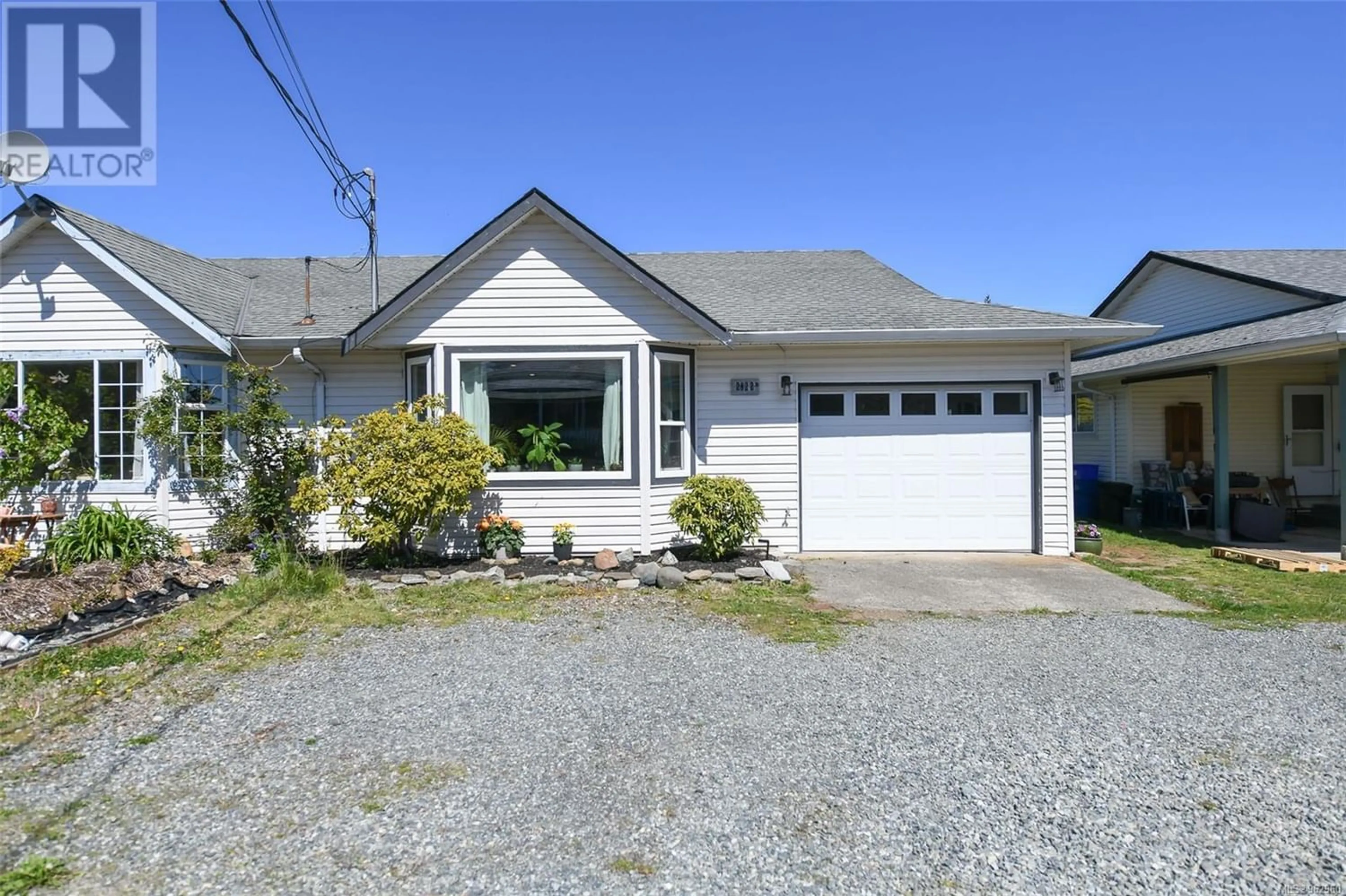 Frontside or backside of a home for B 2822 Windermere Ave, Cumberland British Columbia V0R1S0