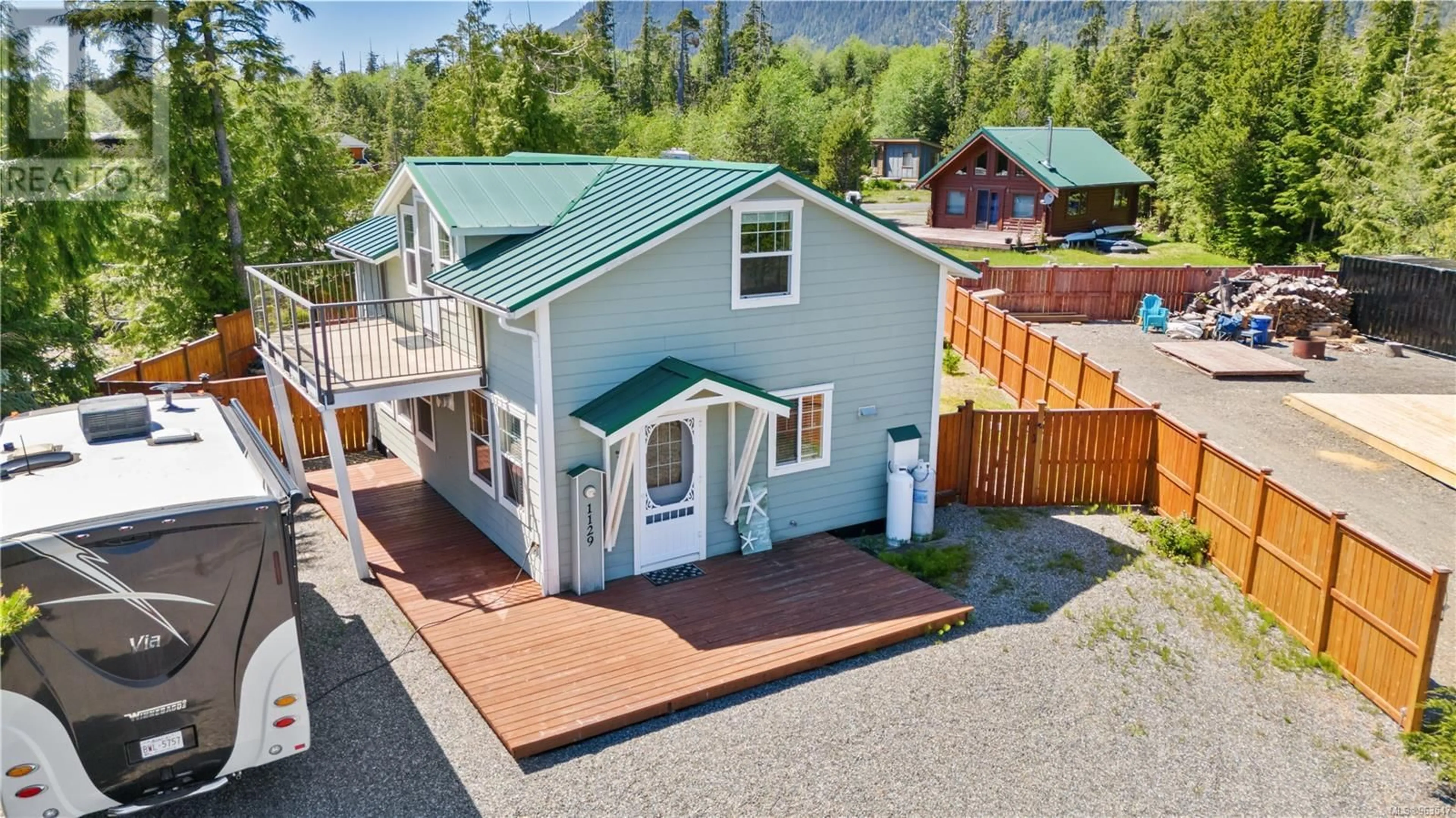 A pic from outside/outdoor area/front of a property/back of a property/a pic from drone, mountain view for 1129 FIFTH AVENUE, Ucluelet British Columbia V0R3A0