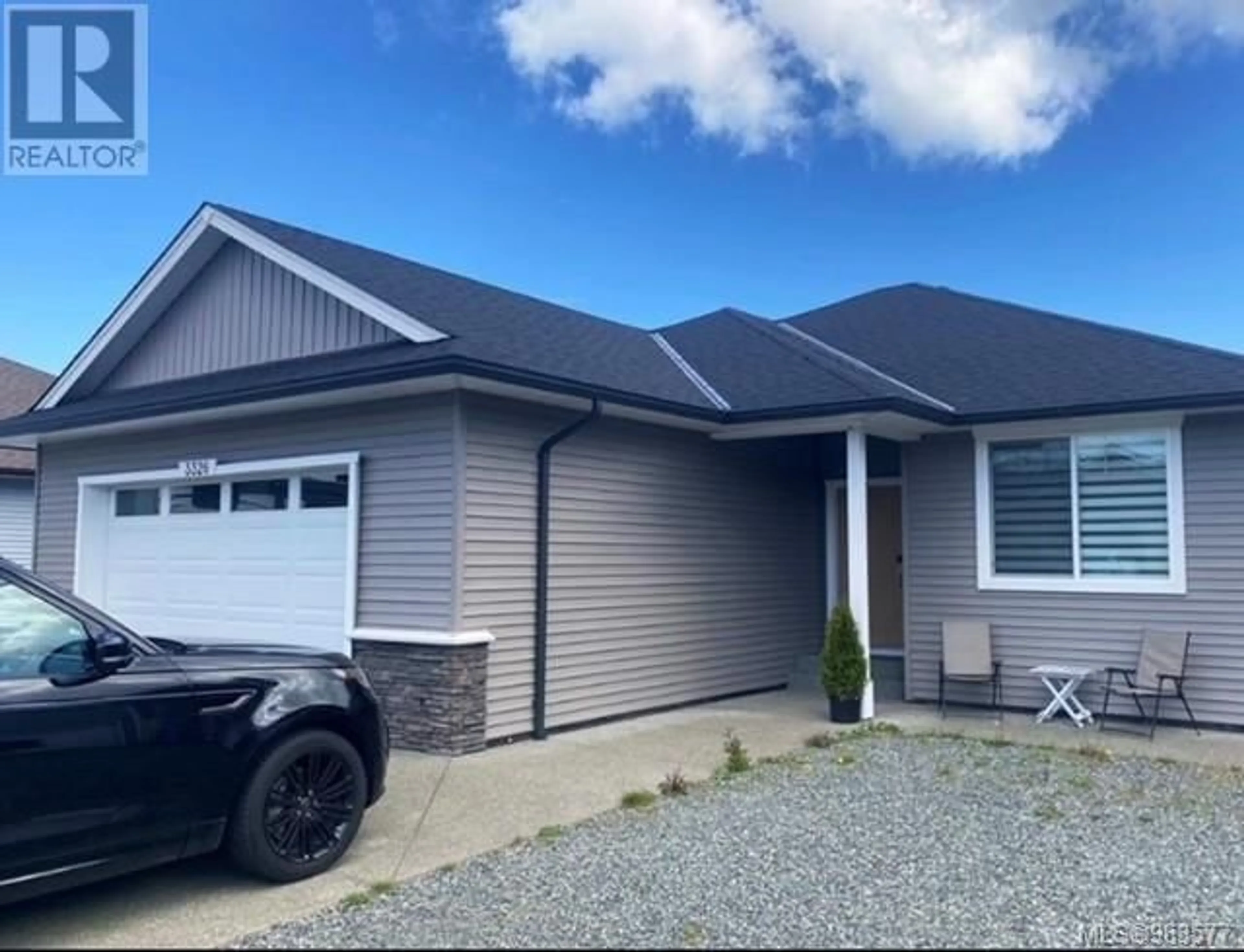 Frontside or backside of a home for 3326 Solport St, Cumberland British Columbia V0R1S0