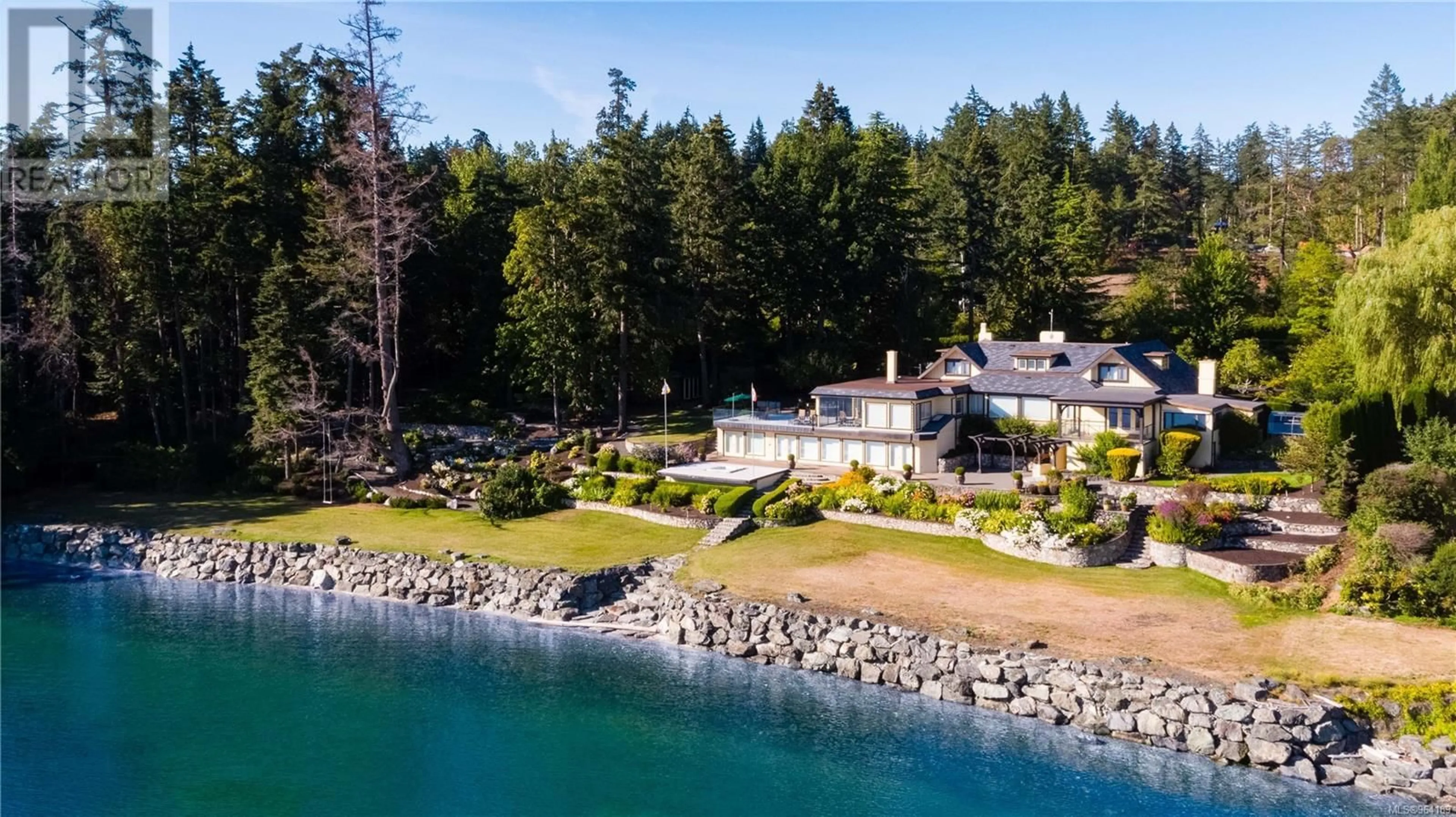 A pic from outside/outdoor area/front of a property/back of a property/a pic from drone, water/lake/river/ocean view for 605 TOWNER PARK ROAD, North Saanich British Columbia V8L5L7