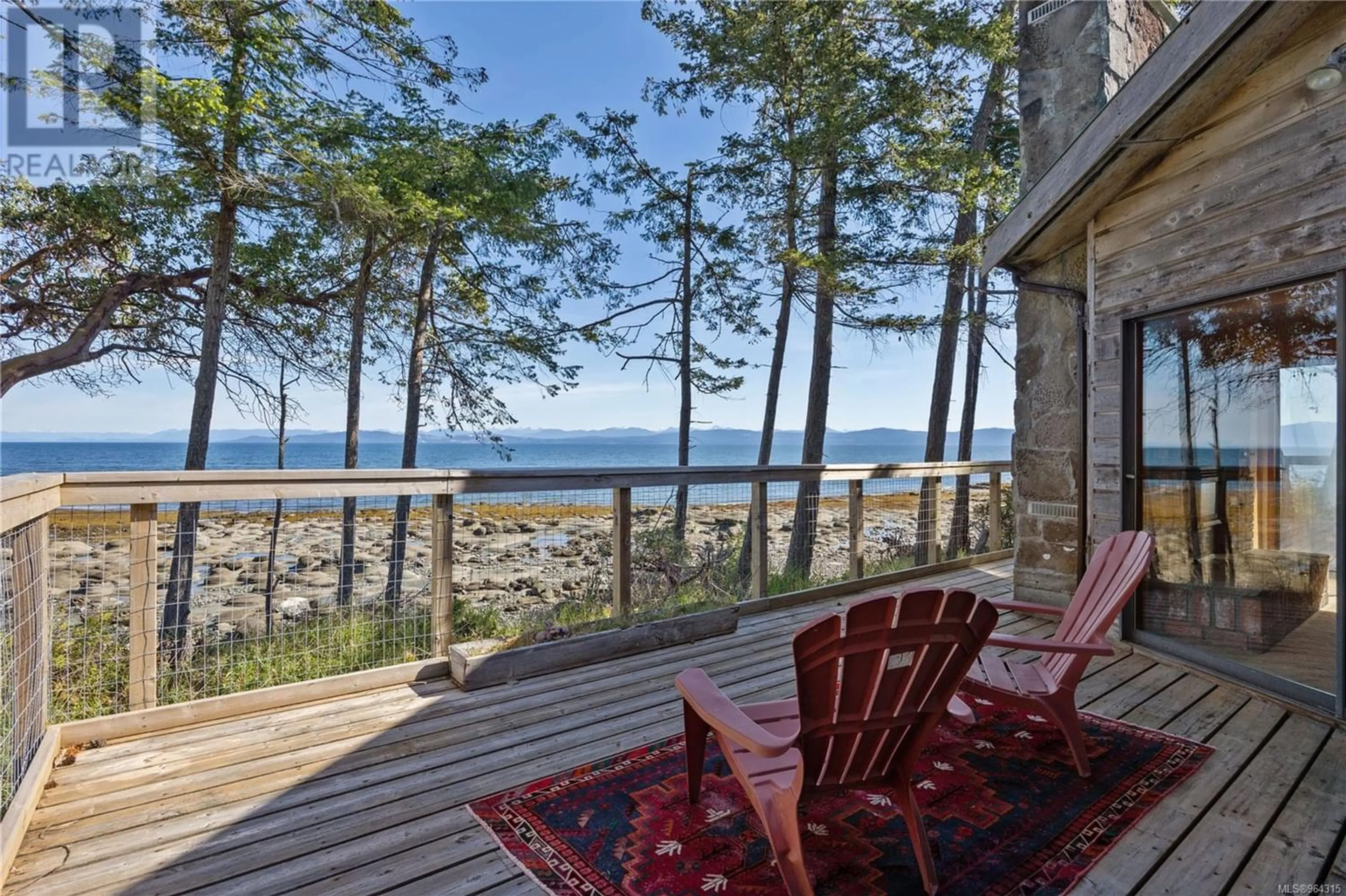 Patio, cottage for 6055 MacLean Rd, Hornby Island British Columbia V0R1Z0