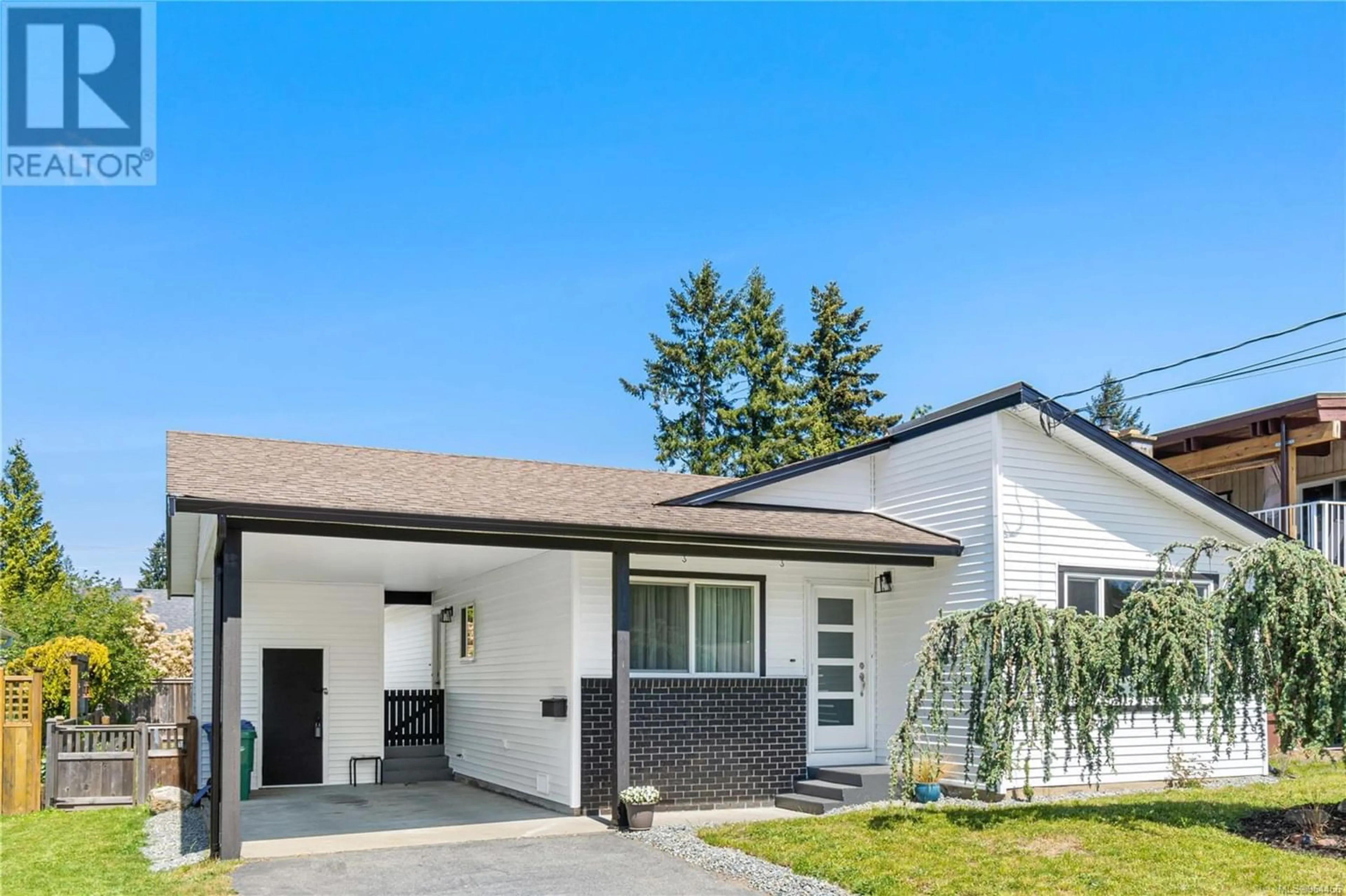 Frontside or backside of a home for 4260 Clubhouse Dr, Nanaimo British Columbia V9T4H7
