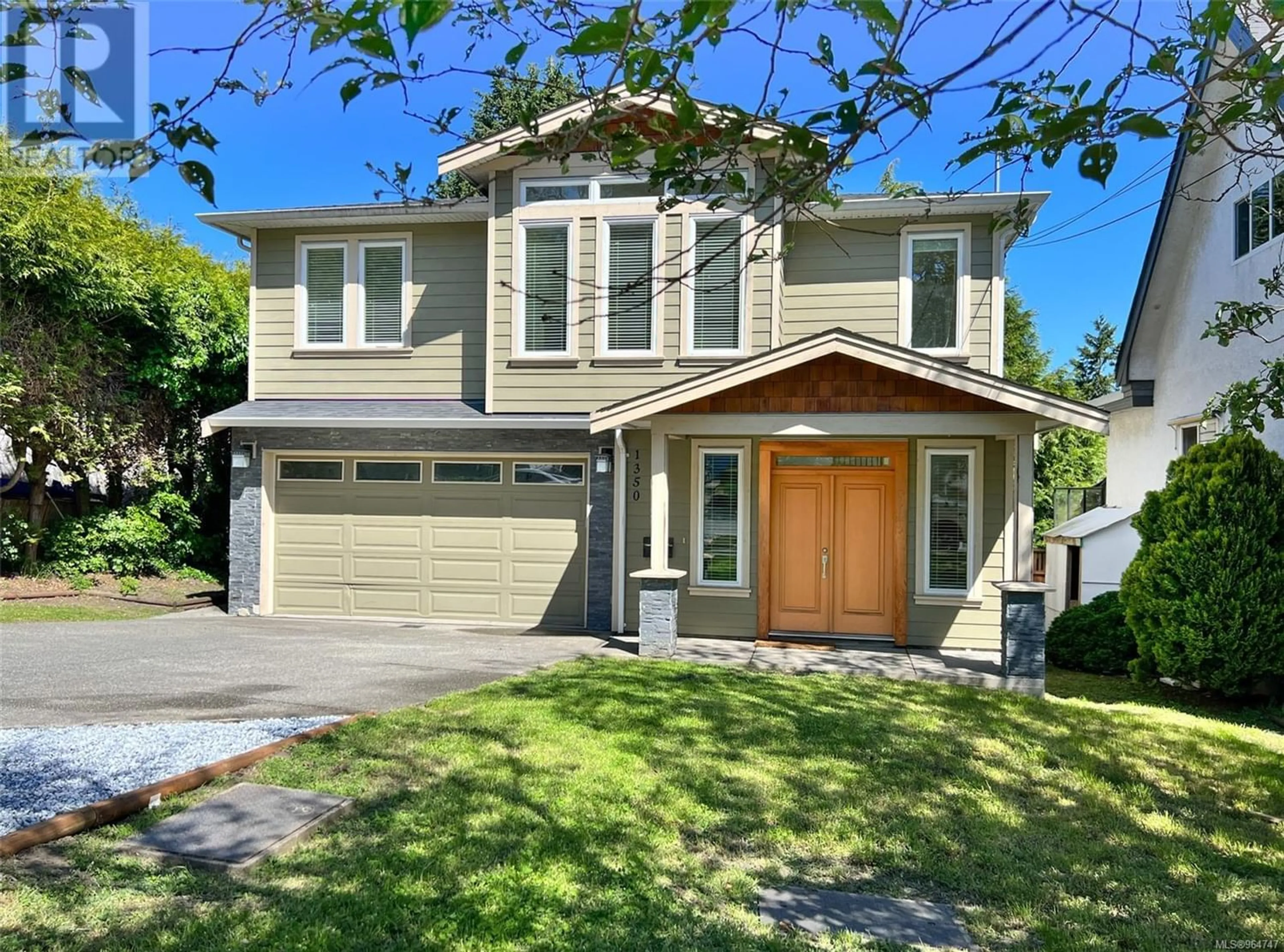 Frontside or backside of a home for 1350 McNair St, Victoria British Columbia V8T2S3