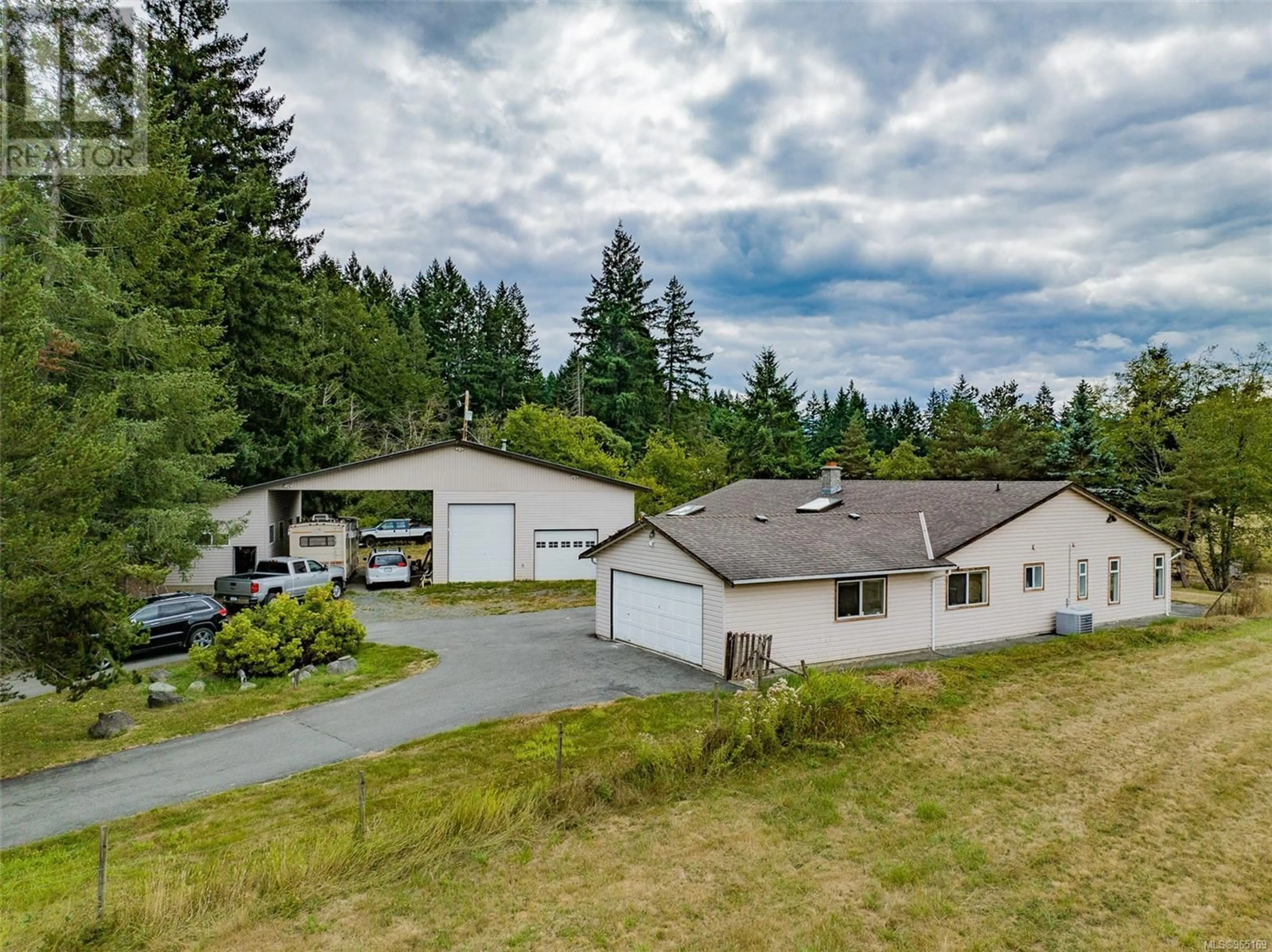 Frontside or backside of a home, cottage for 2445 Godfrey Rd, Nanaimo British Columbia V9X1E6