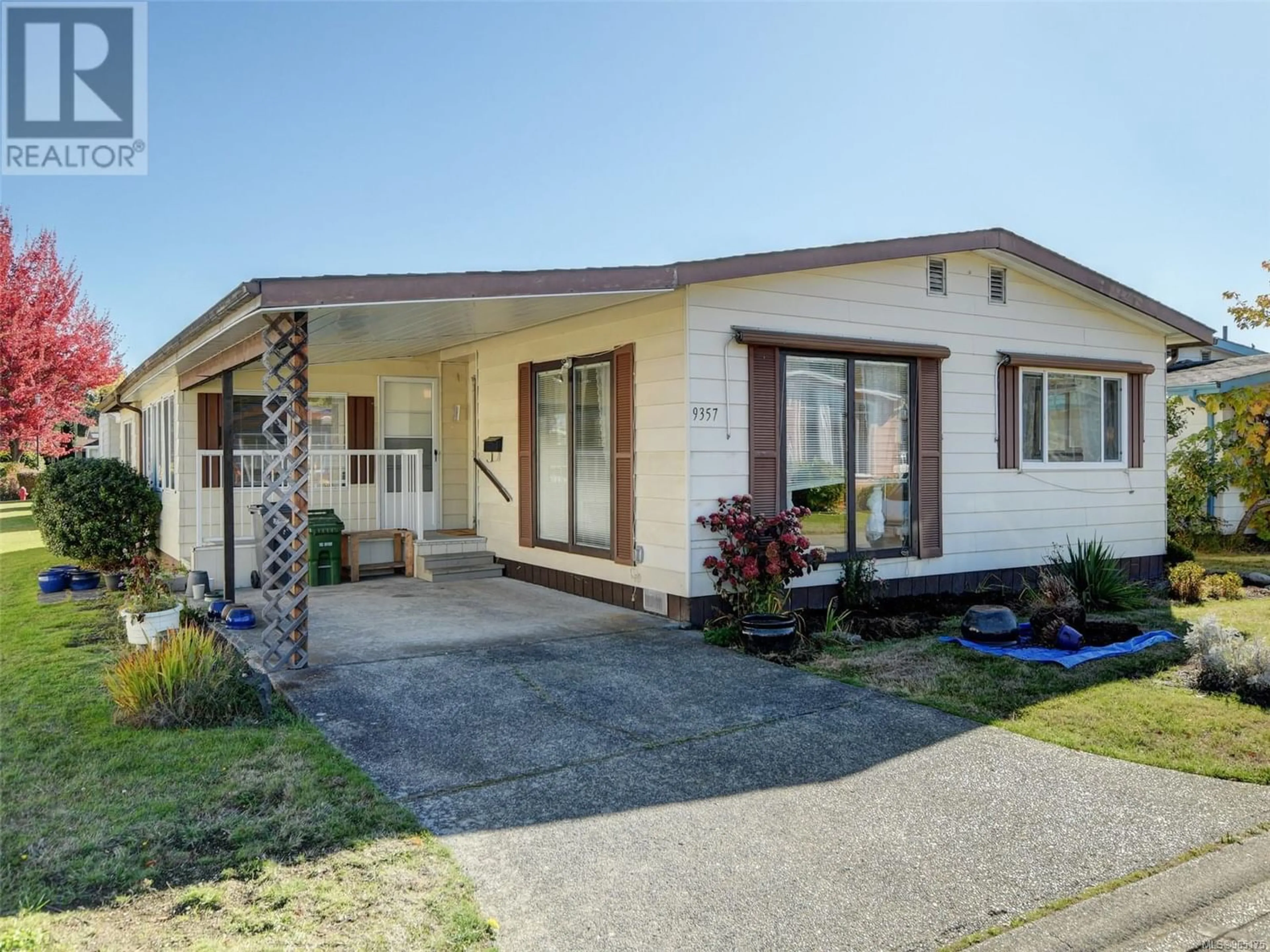 Frontside or backside of a home for 9357 Village Way, Sidney British Columbia V8L4K8