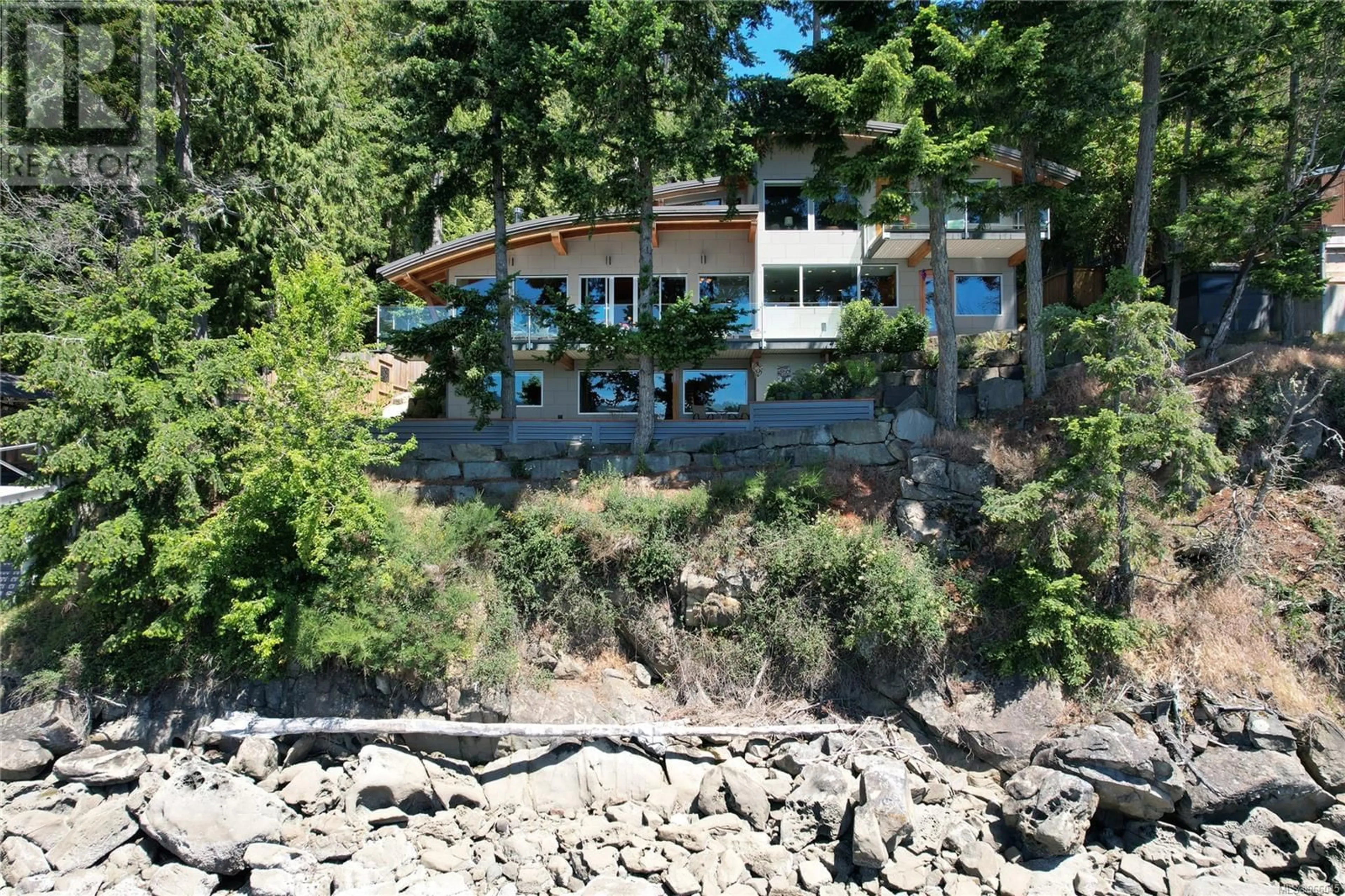 A pic from outside/outdoor area/front of a property/back of a property/a pic from drone, water/lake/river/ocean view for 416 Old Scott Rd, Salt Spring British Columbia V8K2L7