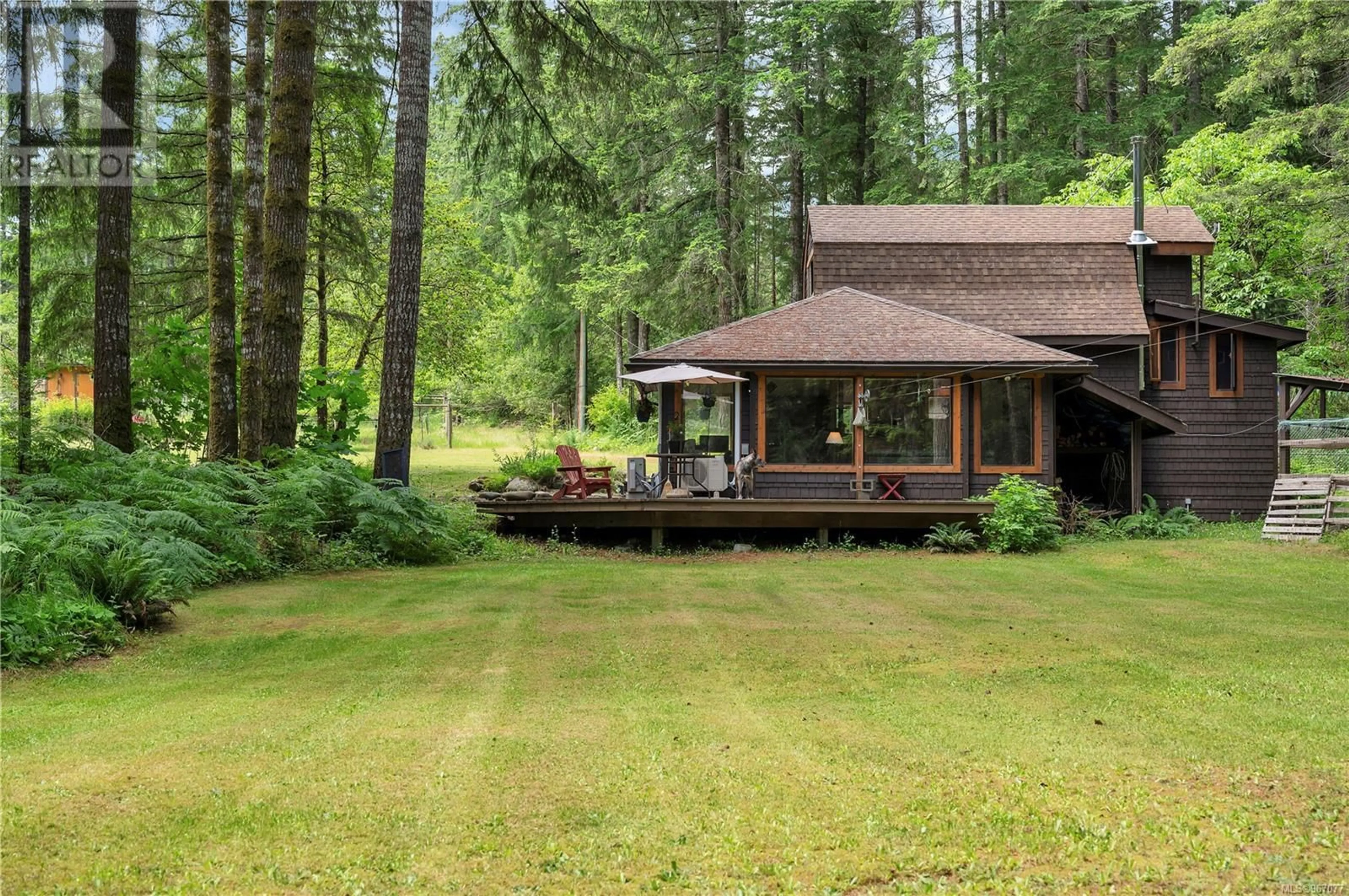 Frontside or backside of a home, cottage for 4225 Macaulay Rd, Black Creek British Columbia V9J1C9