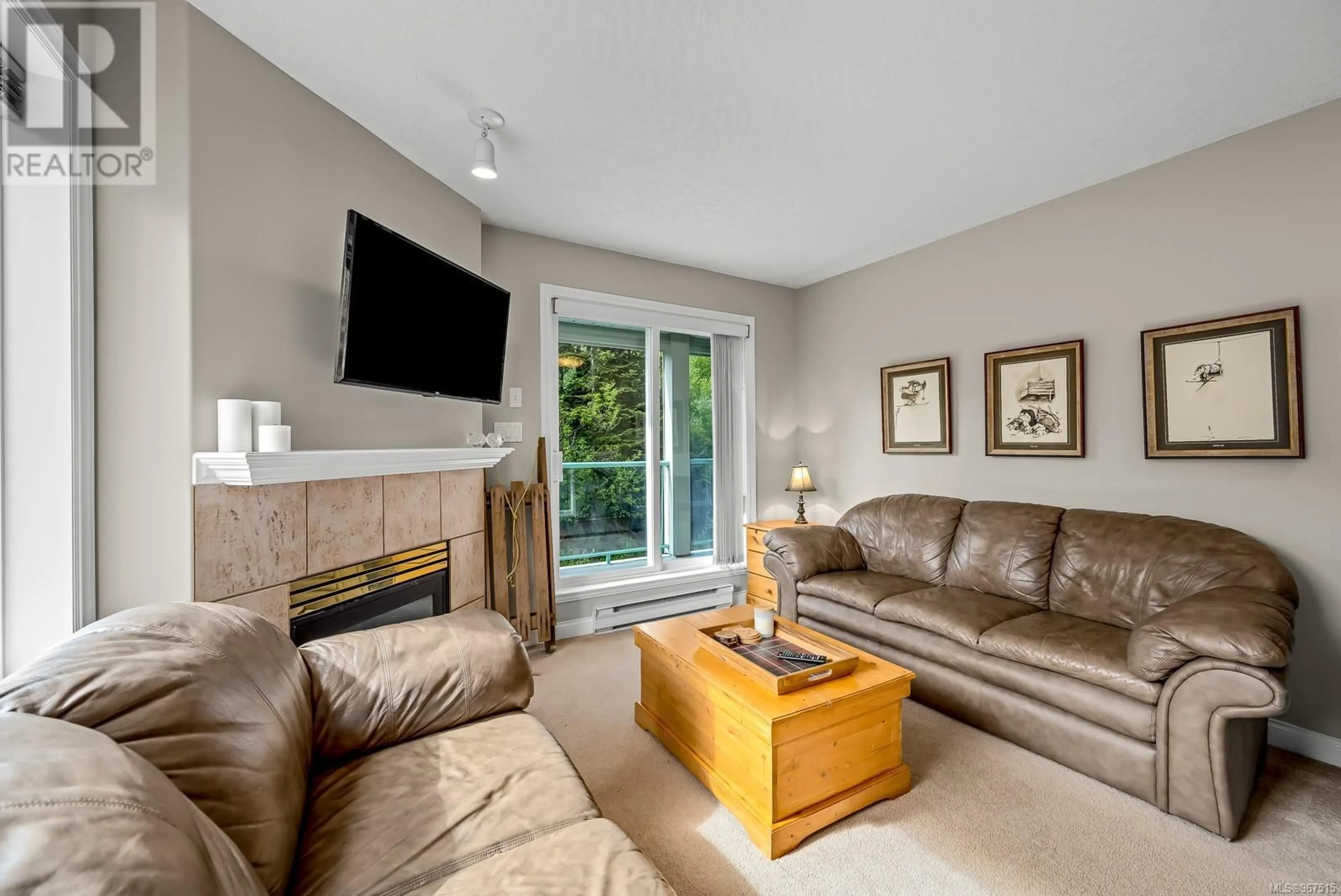 Living room, wood floors for 205 1340 Henry Rd, Courtenay British Columbia V9J1L0