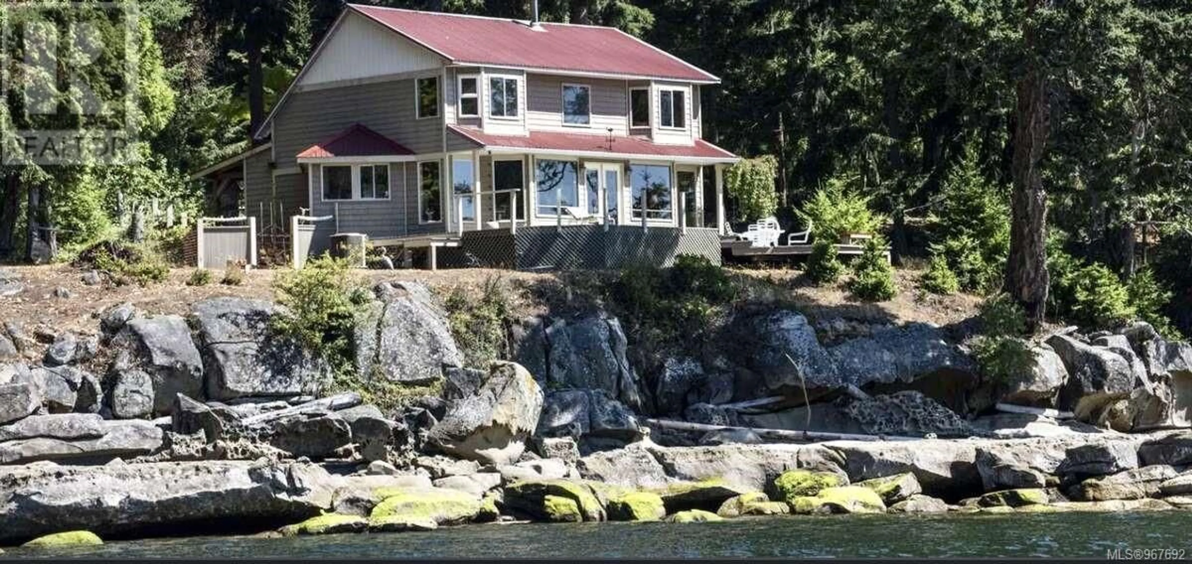 Frontside or backside of a home, cottage for 305 Ling Cod Lane, Mudge Island British Columbia V0R1X0