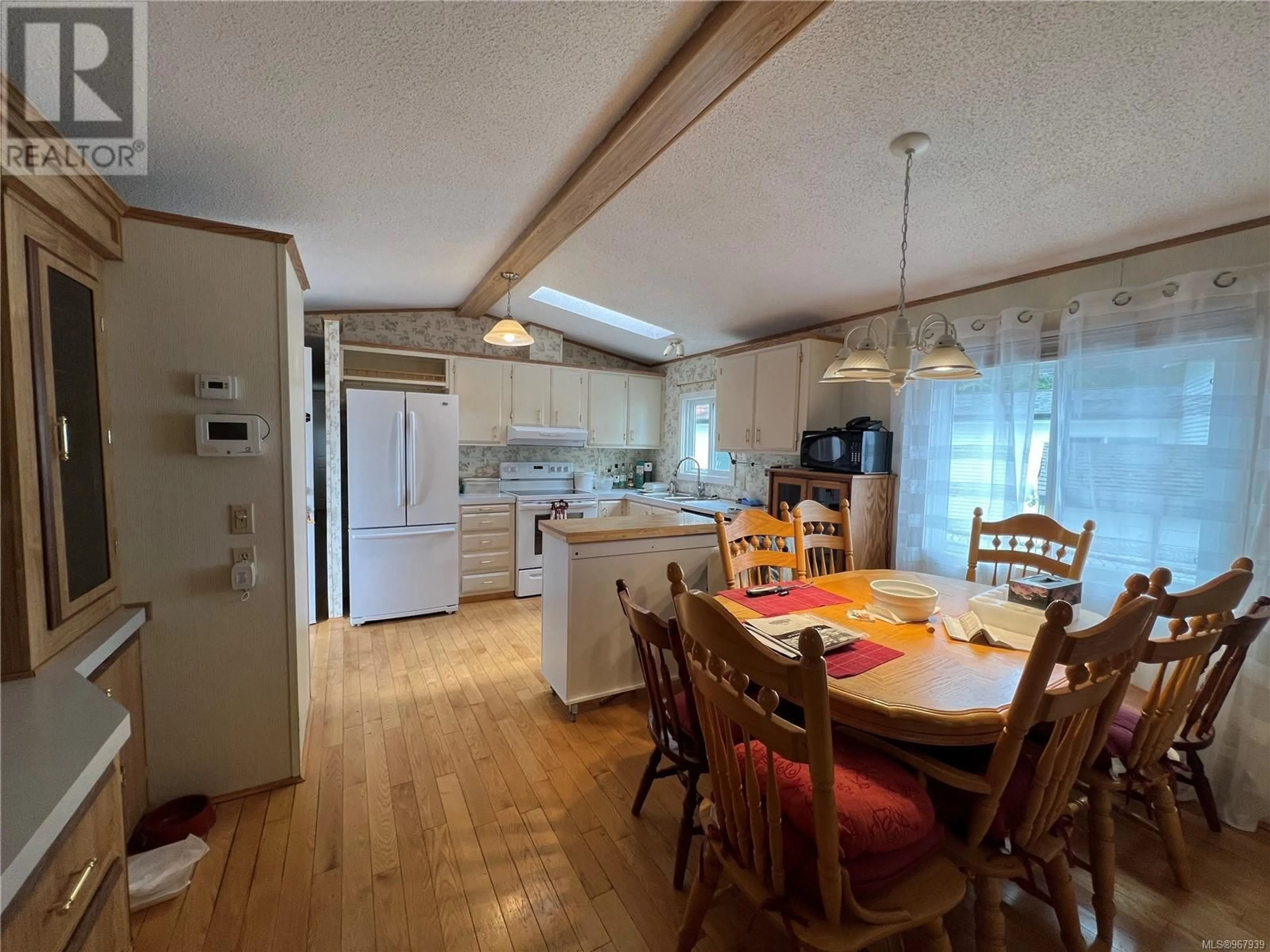 Kitchen, wood floors, cottage for 610 Conuma Dr, Gold River British Columbia V0P1G0