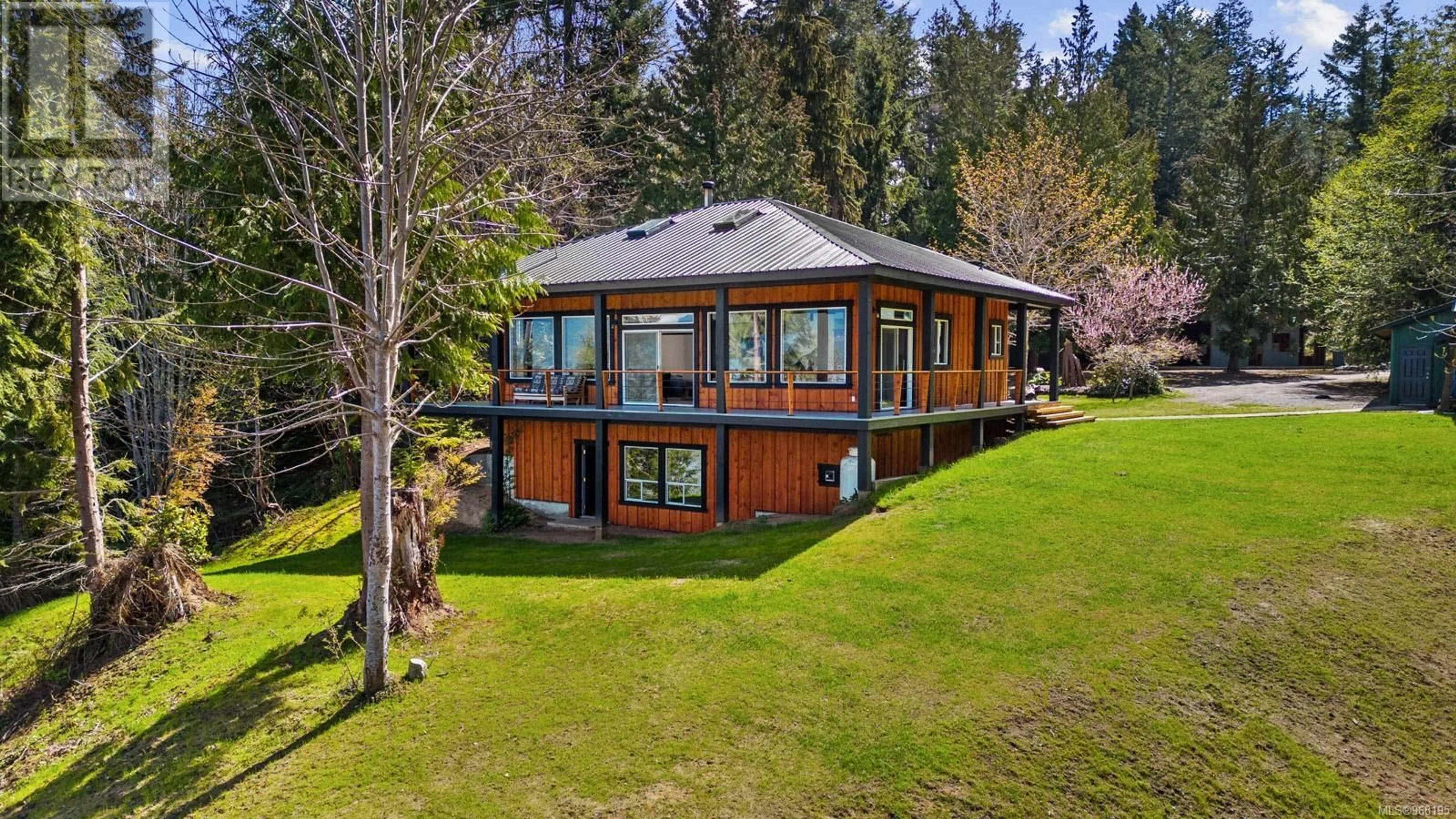 A pic from outside/outdoor area/front of a property/back of a property/a pic from drone, water/lake/river/ocean view for 4 MINE ROAD, Lasqueti Island British Columbia V0R2J0