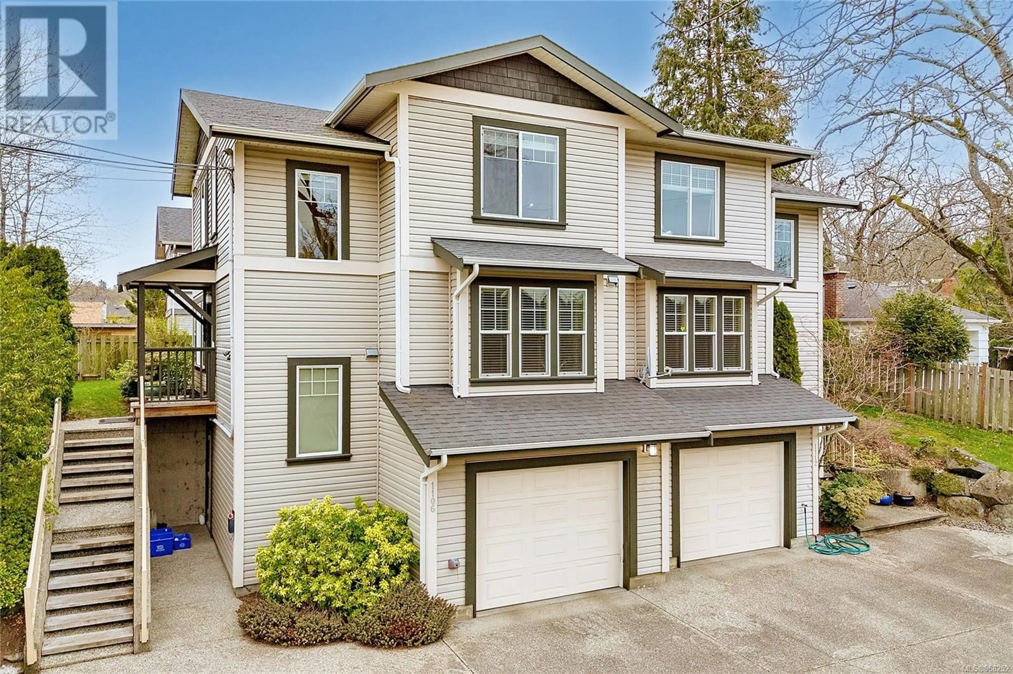 Frontside or backside of a home for 1106 Tolmie Ave, Saanich British Columbia V8V1A1