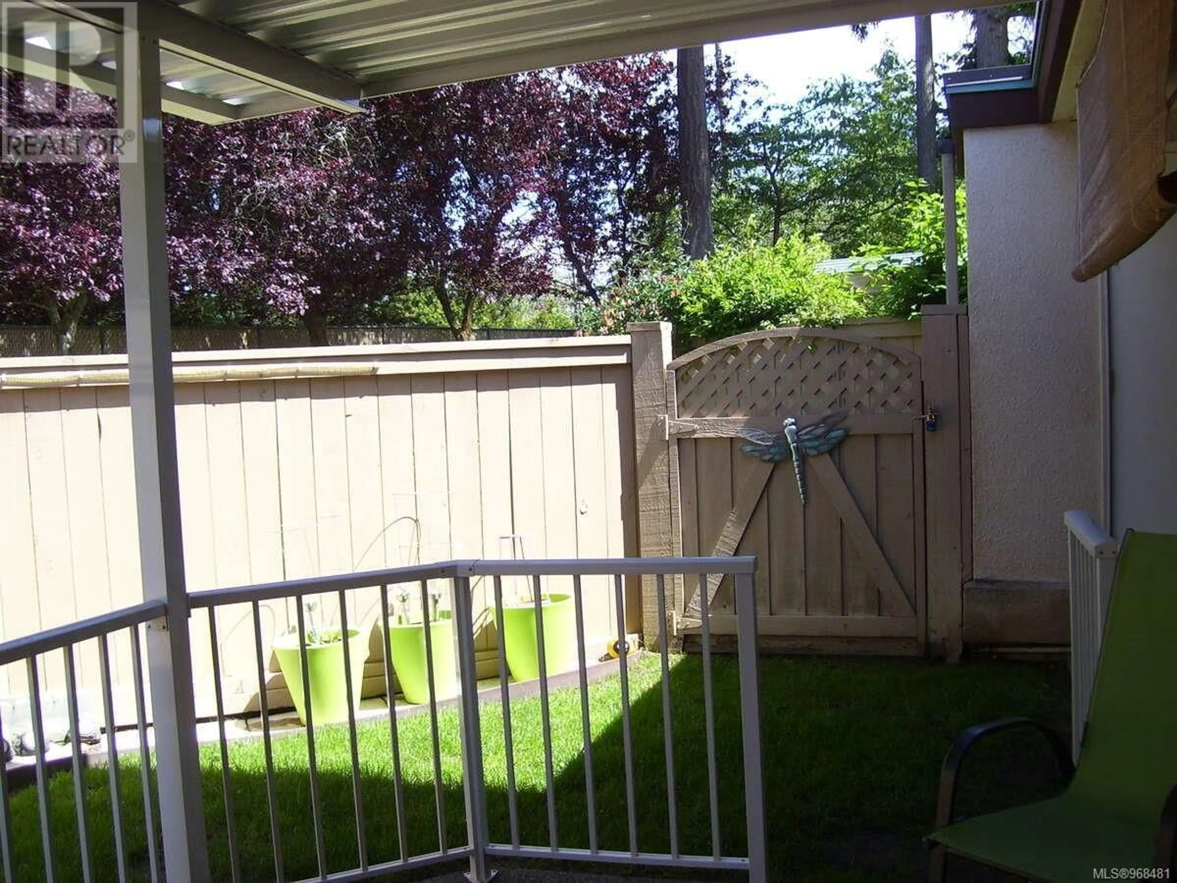 Patio, the fenced backyard for 20 310 Pym St N, Parksville British Columbia V9P2P4