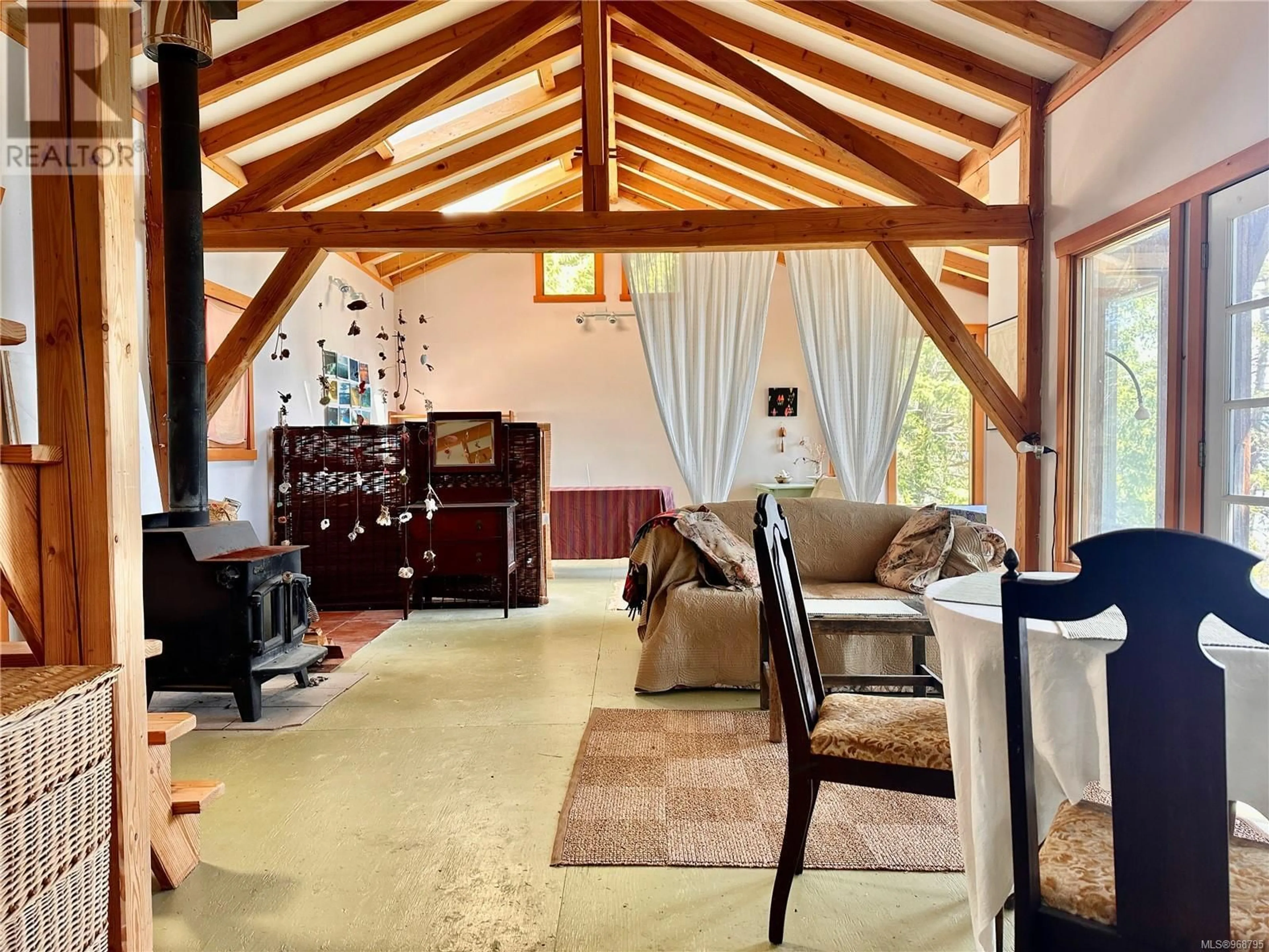 Living room with furniture, unknown for Site 8 - 1815 TIBER BAY ROAD, Cortes Island British Columbia V0P1K0