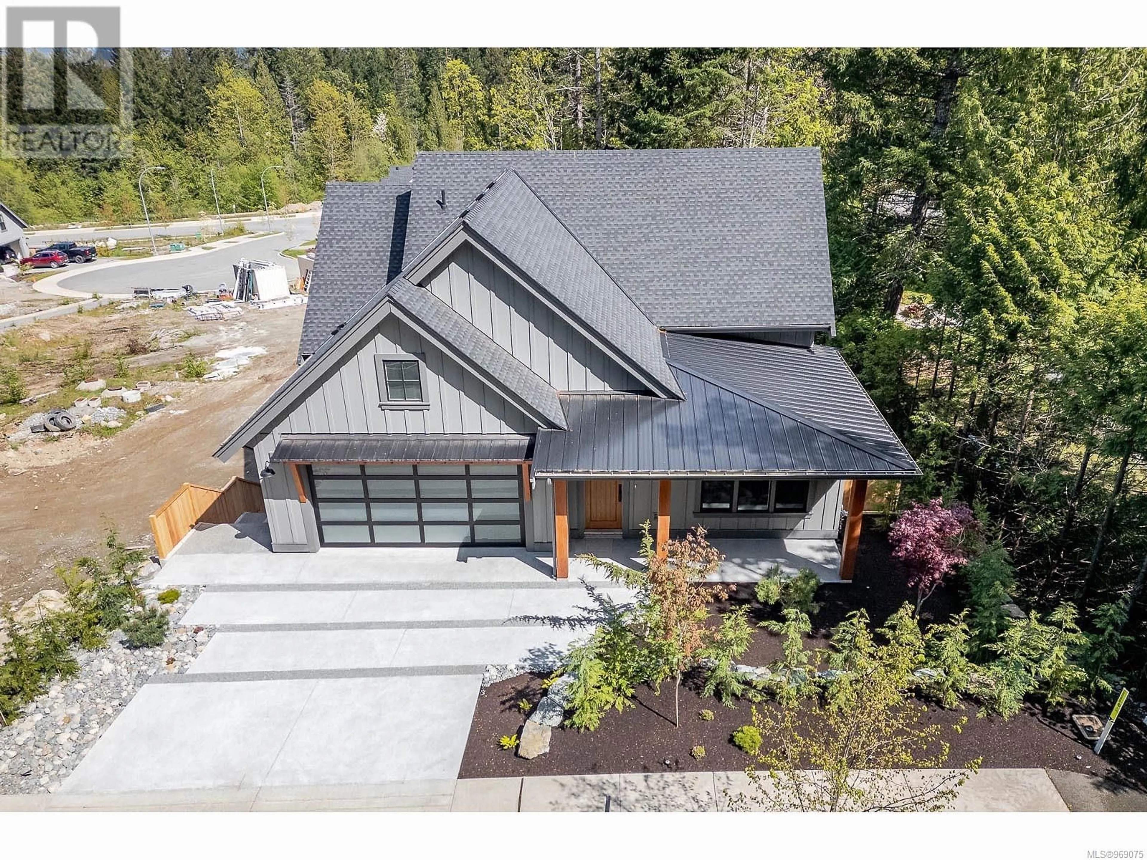 Frontside or backside of a home for 1047 HAREWOOD MINES Rd, Nanaimo British Columbia V9R5P5