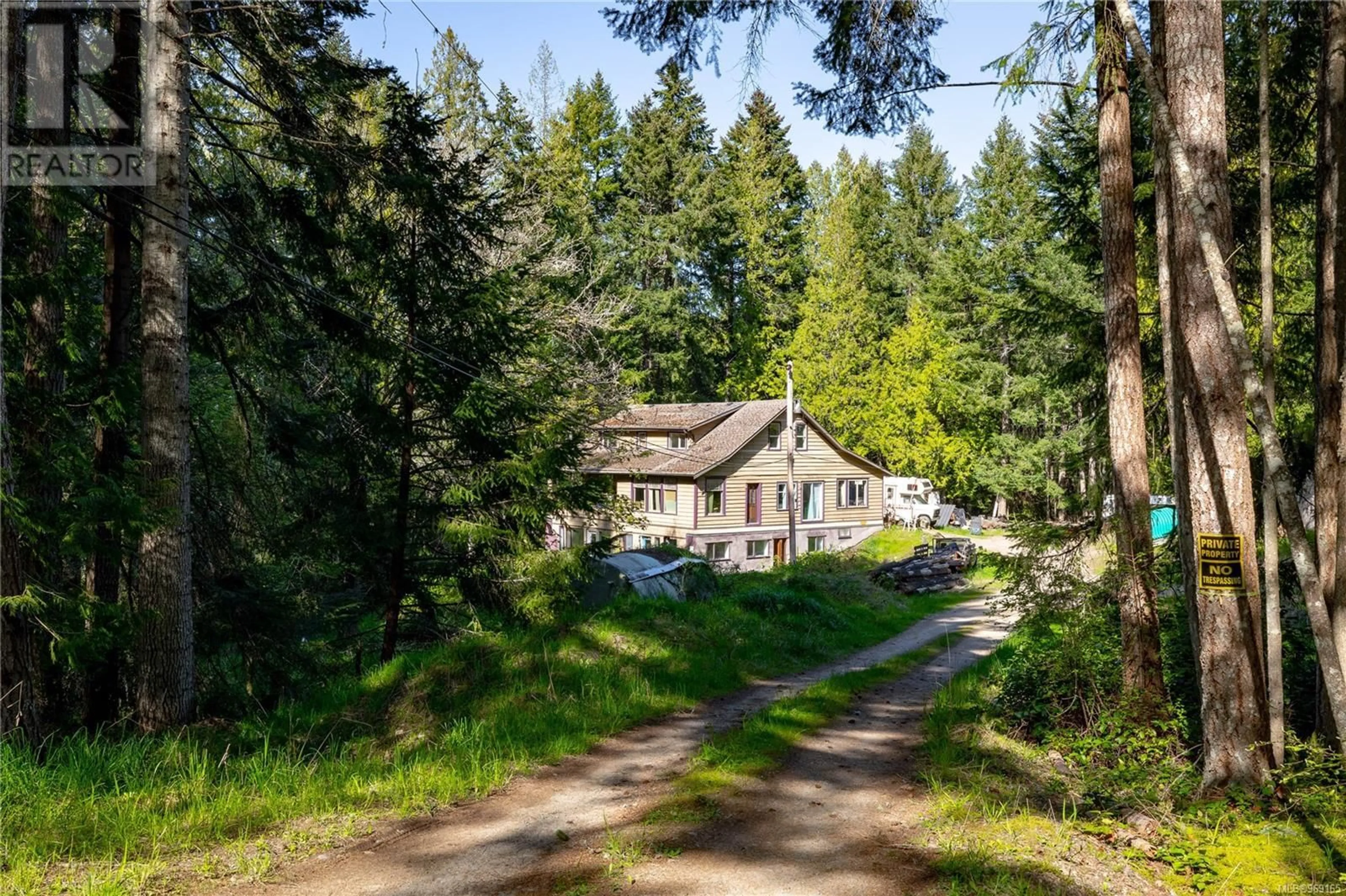 A pic from outside/outdoor area/front of a property/back of a property/a pic from drone, forest/trees view for 584 Rainbow Rd, Salt Spring British Columbia V8K2M8