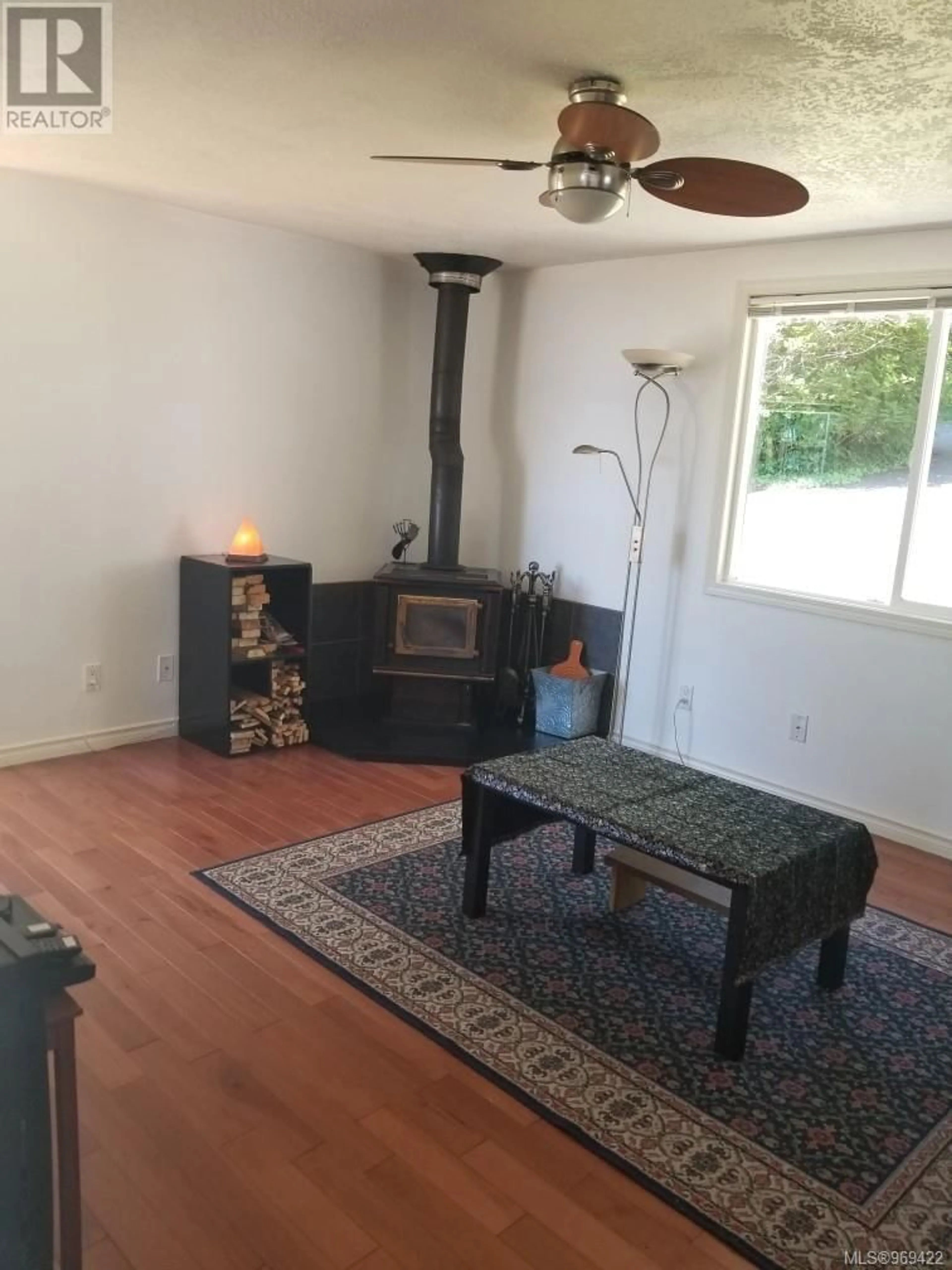 Living room, wood floors for 6 8177 West Coast Rd, Sooke British Columbia V9Z1E2