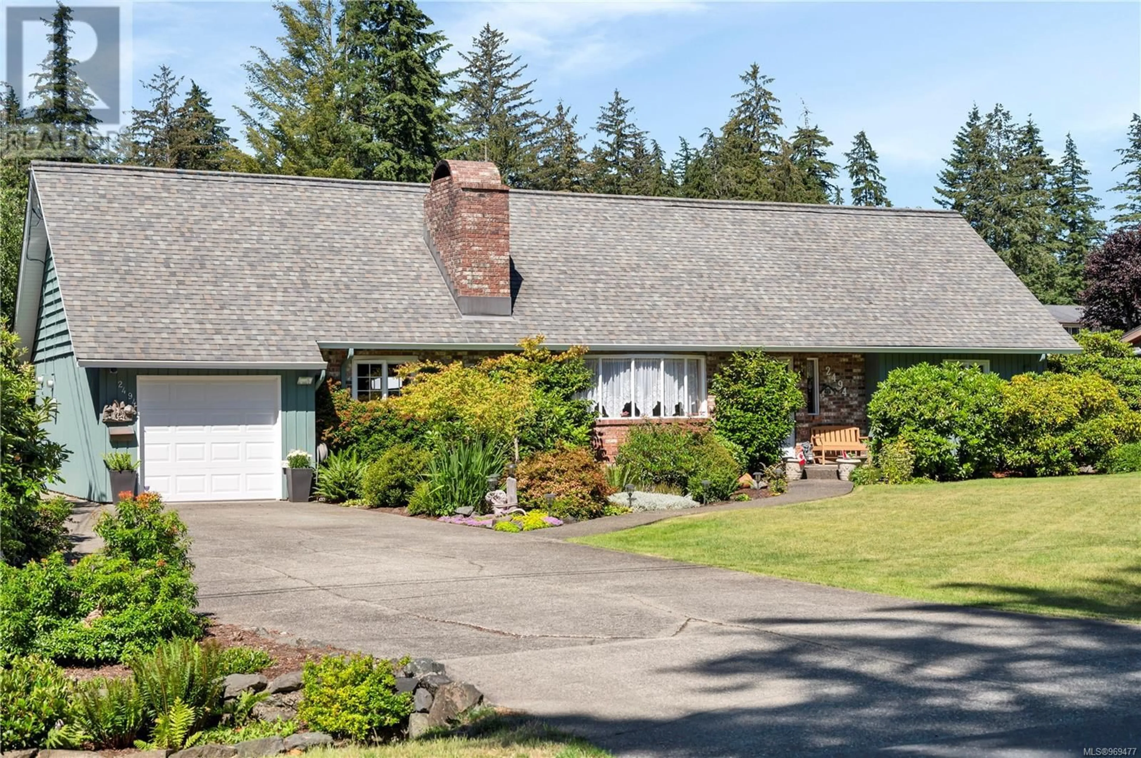 Frontside or backside of a home for 2494 COHO Rd, Campbell River British Columbia V9W4W4