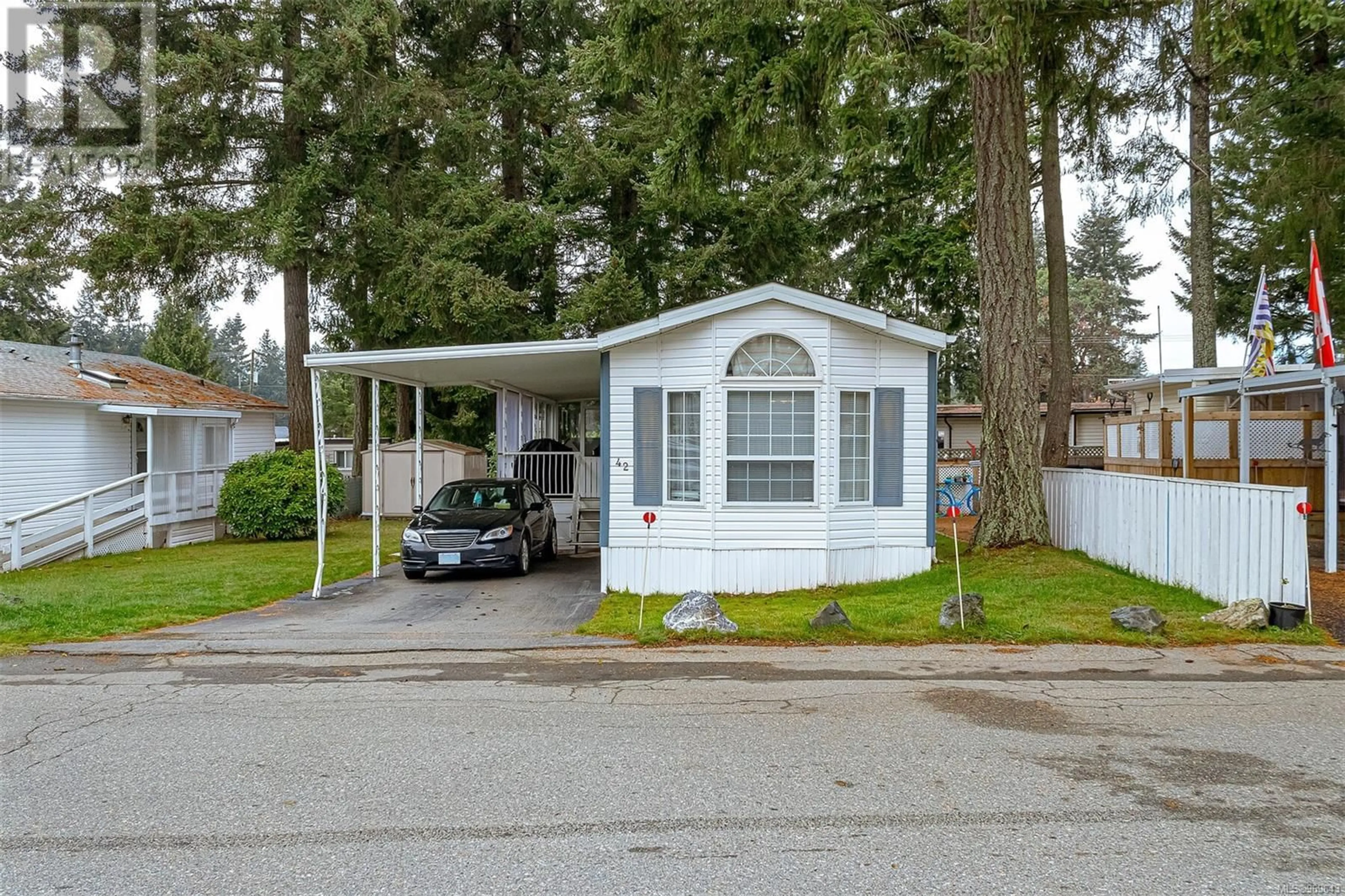 Home with vinyl exterior material for 42 5854 Turner Rd, Nanaimo British Columbia V9T2N6