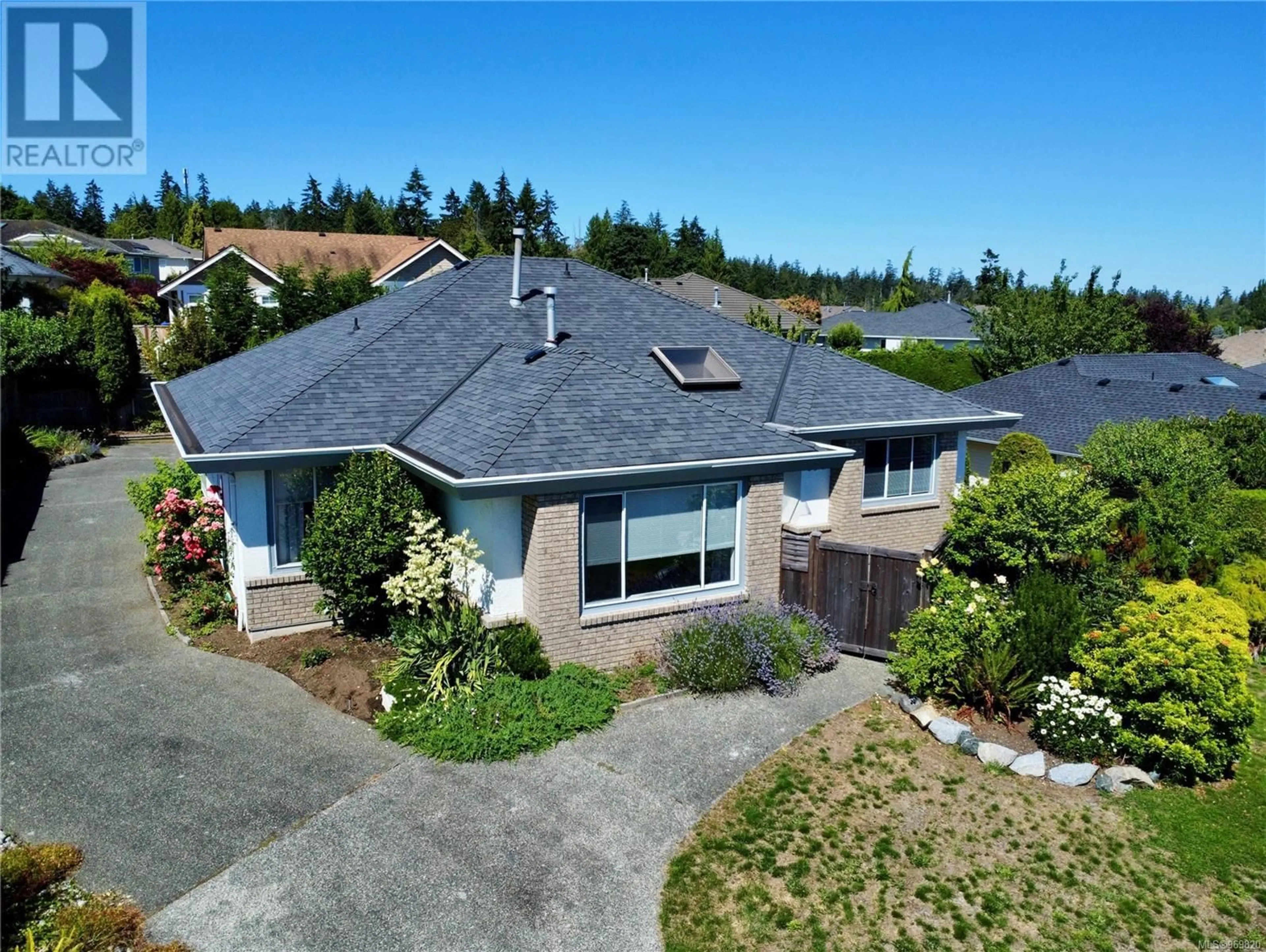 Frontside or backside of a home for 970 Royal Dornoch Dr, Qualicum Beach British Columbia V9K1E1