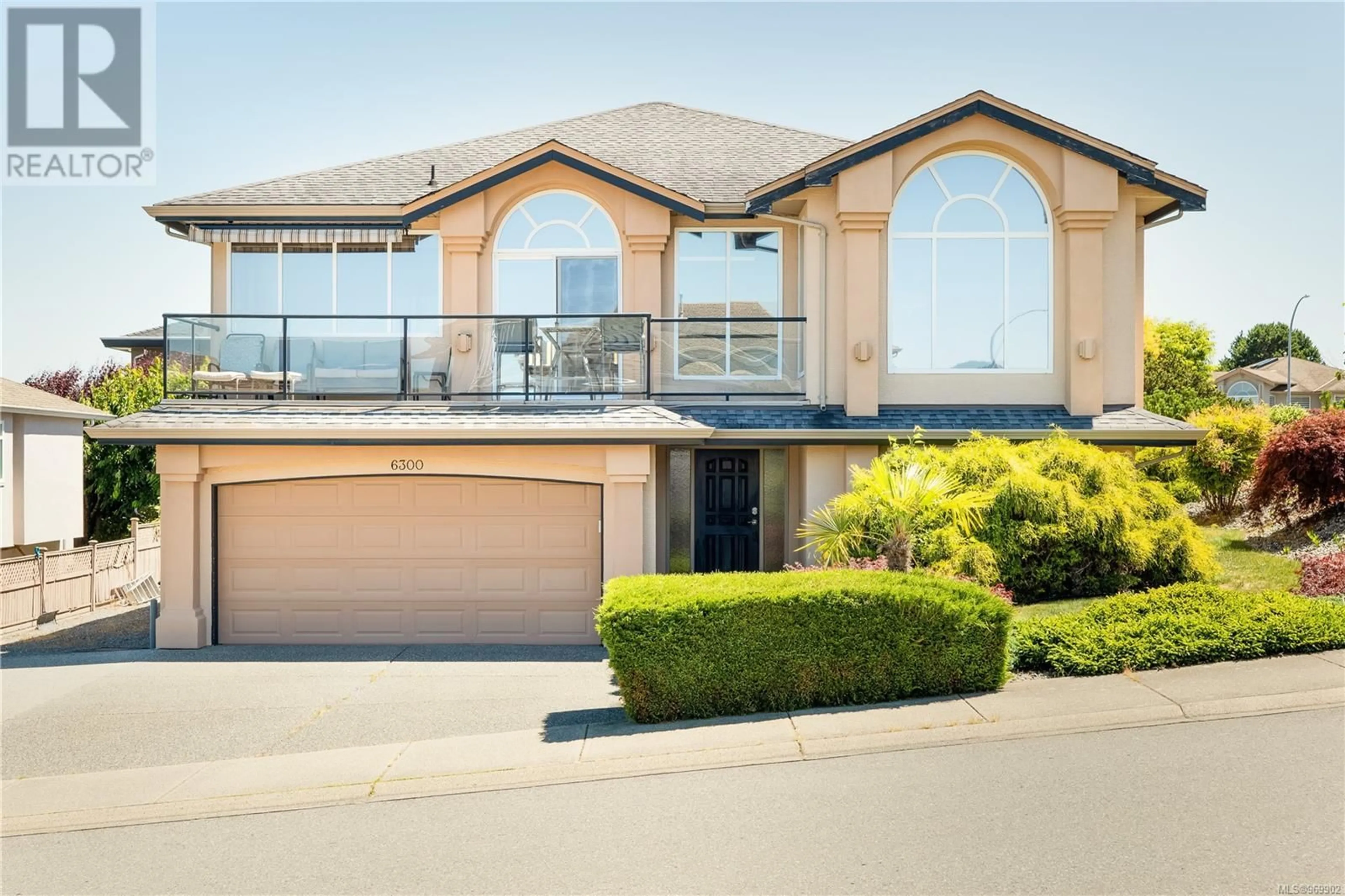 Frontside or backside of a home, the street view for 6300 Corfu Dr, Nanaimo British Columbia V9V1N5