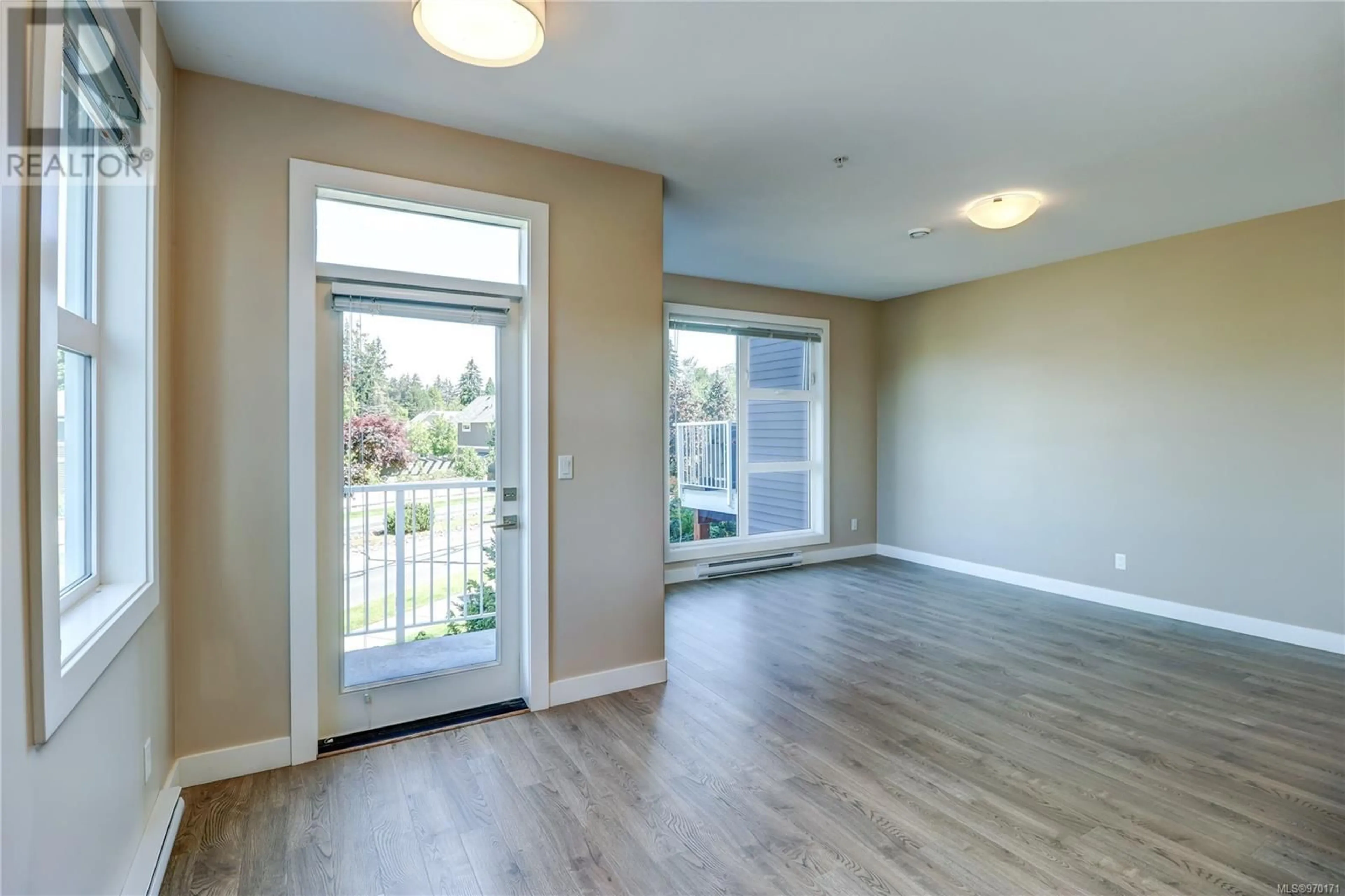 A pic of a room, wood floors for 104 1800 Summerhill Pl, Nanaimo British Columbia V9P2W3