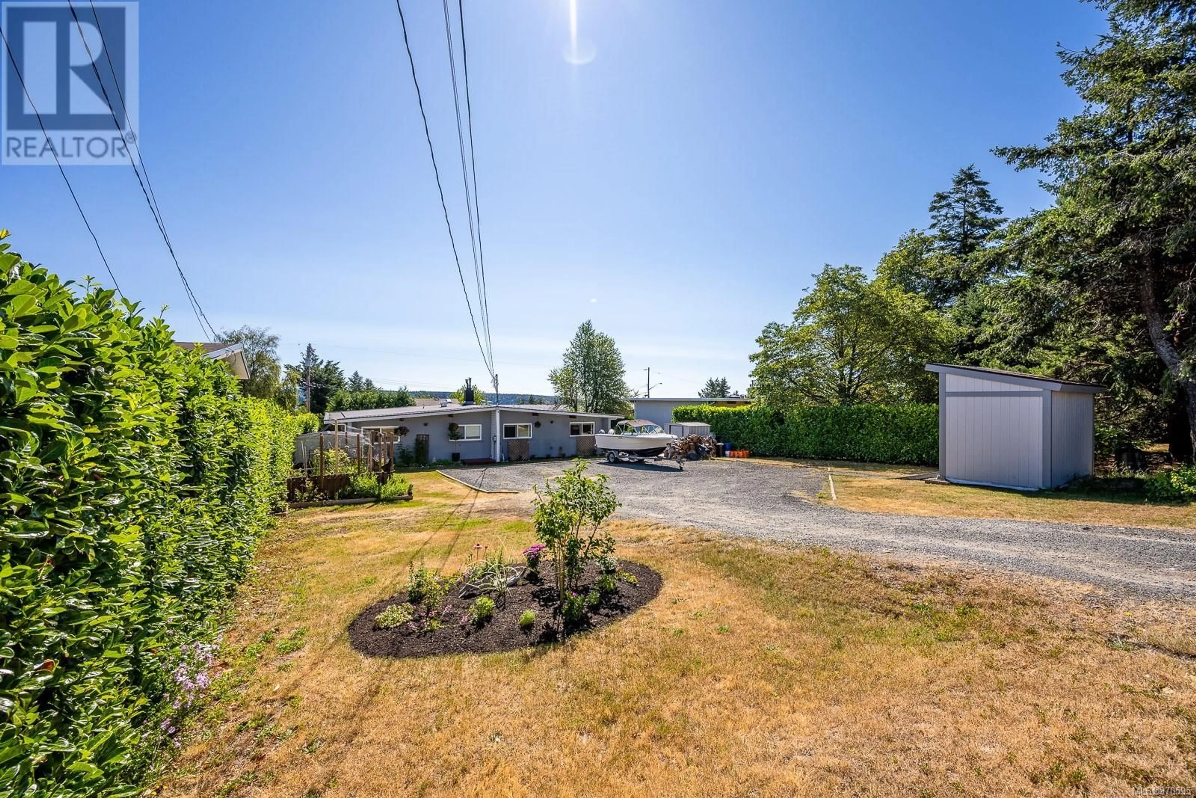 Fenced yard for 322 McLean St, Campbell River British Columbia V9W2M6