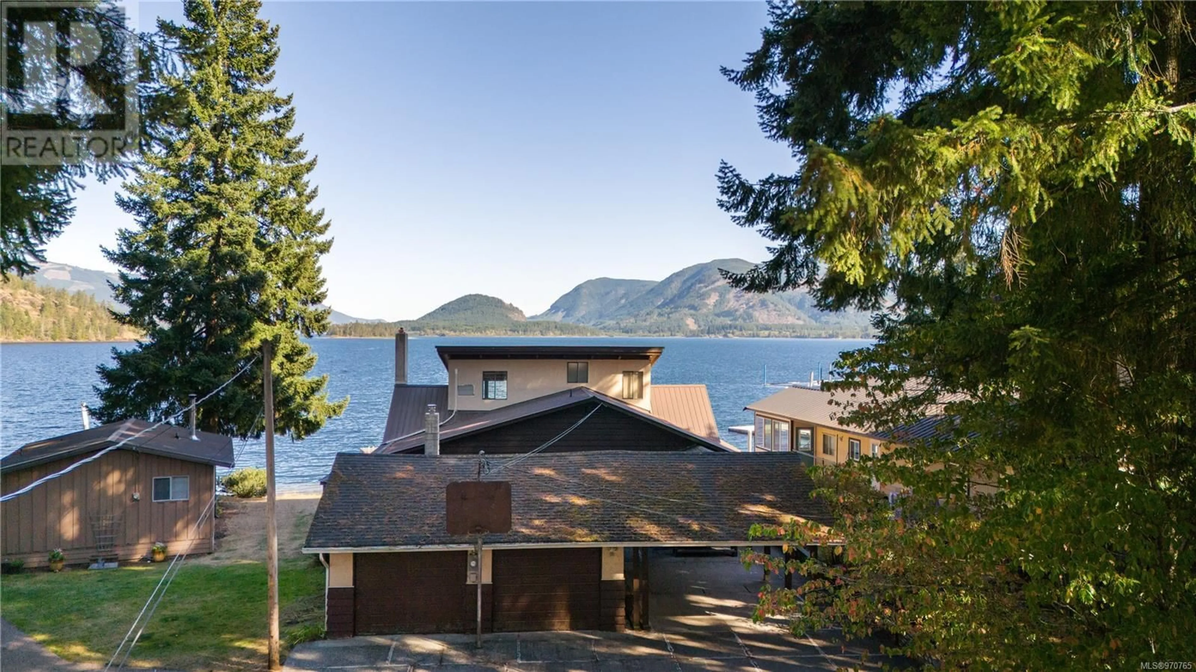 A pic from exterior of the house or condo, lake for 7285 Walton Rd, Honeymoon Bay British Columbia V0R1Y0