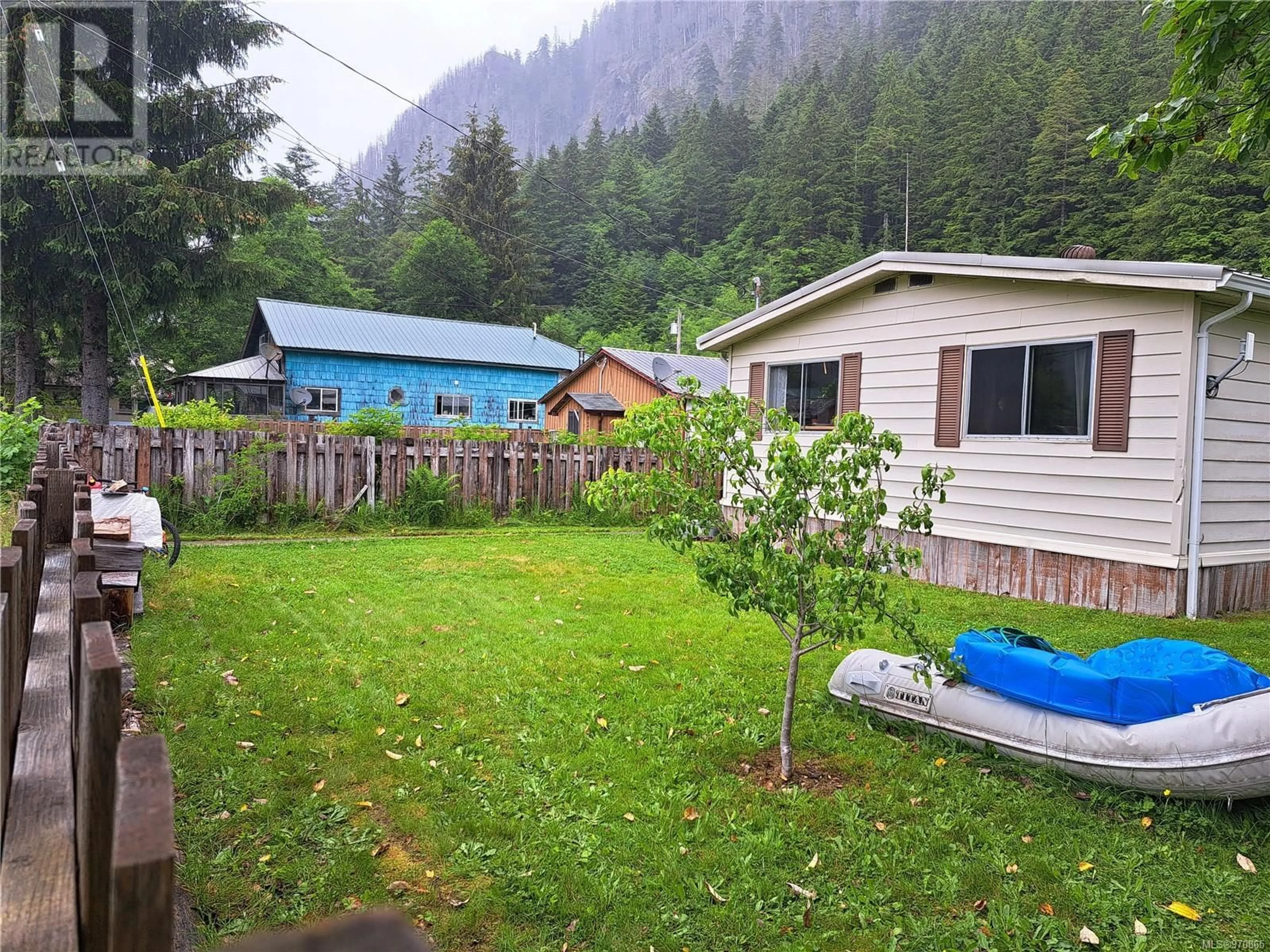 Fenced yard for 132 Maquinna Ave, Zeballos British Columbia V0P2A0