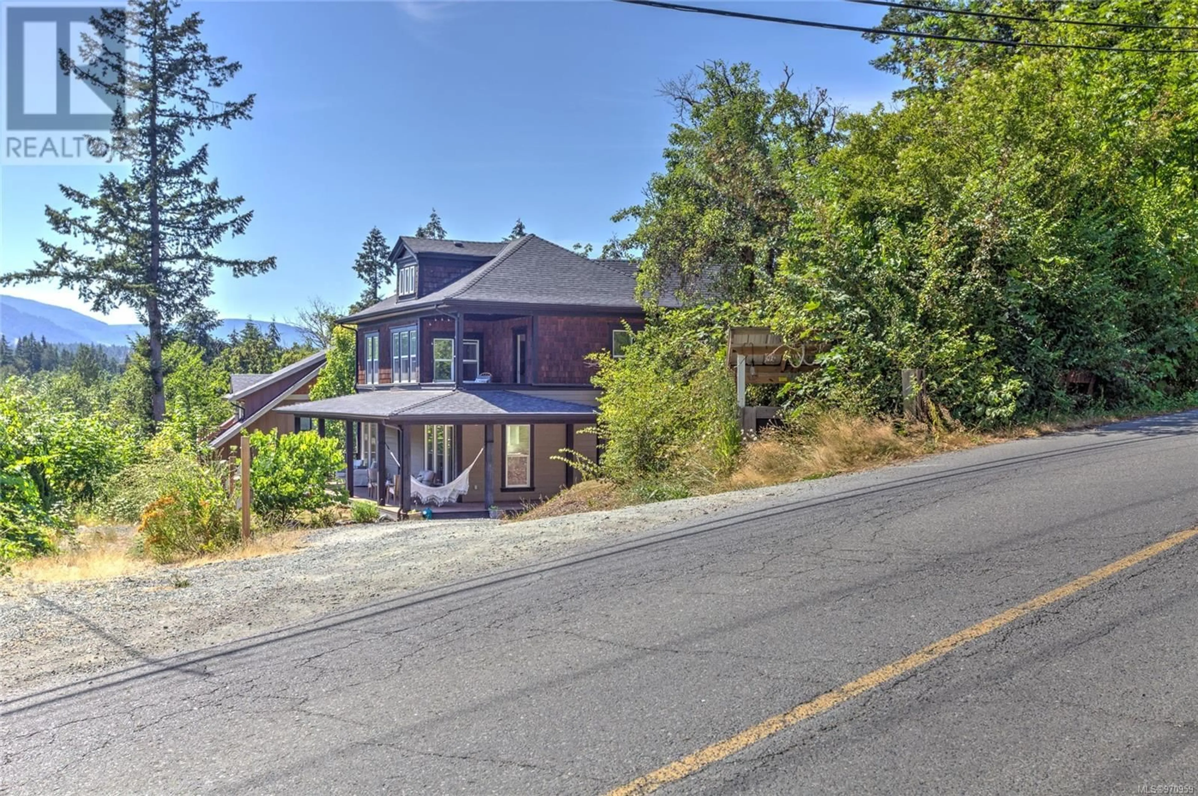 A pic from exterior of the house or condo, the street view for 4504 Bench Rd, Duncan British Columbia V8L6M6