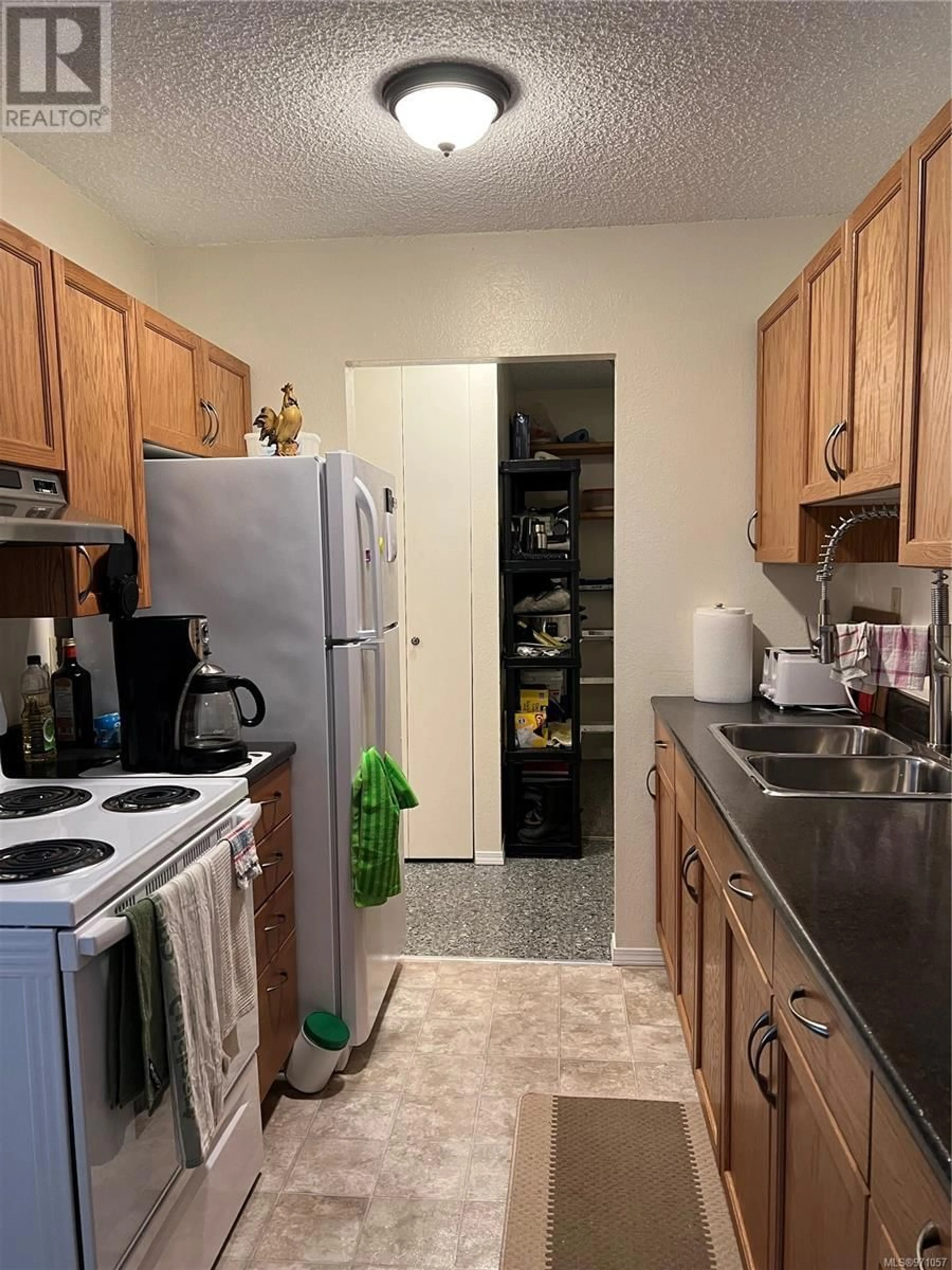 Standard kitchen, unknown floor for 202 651 Maquinna Dr N, Tahsis British Columbia V0P1X0