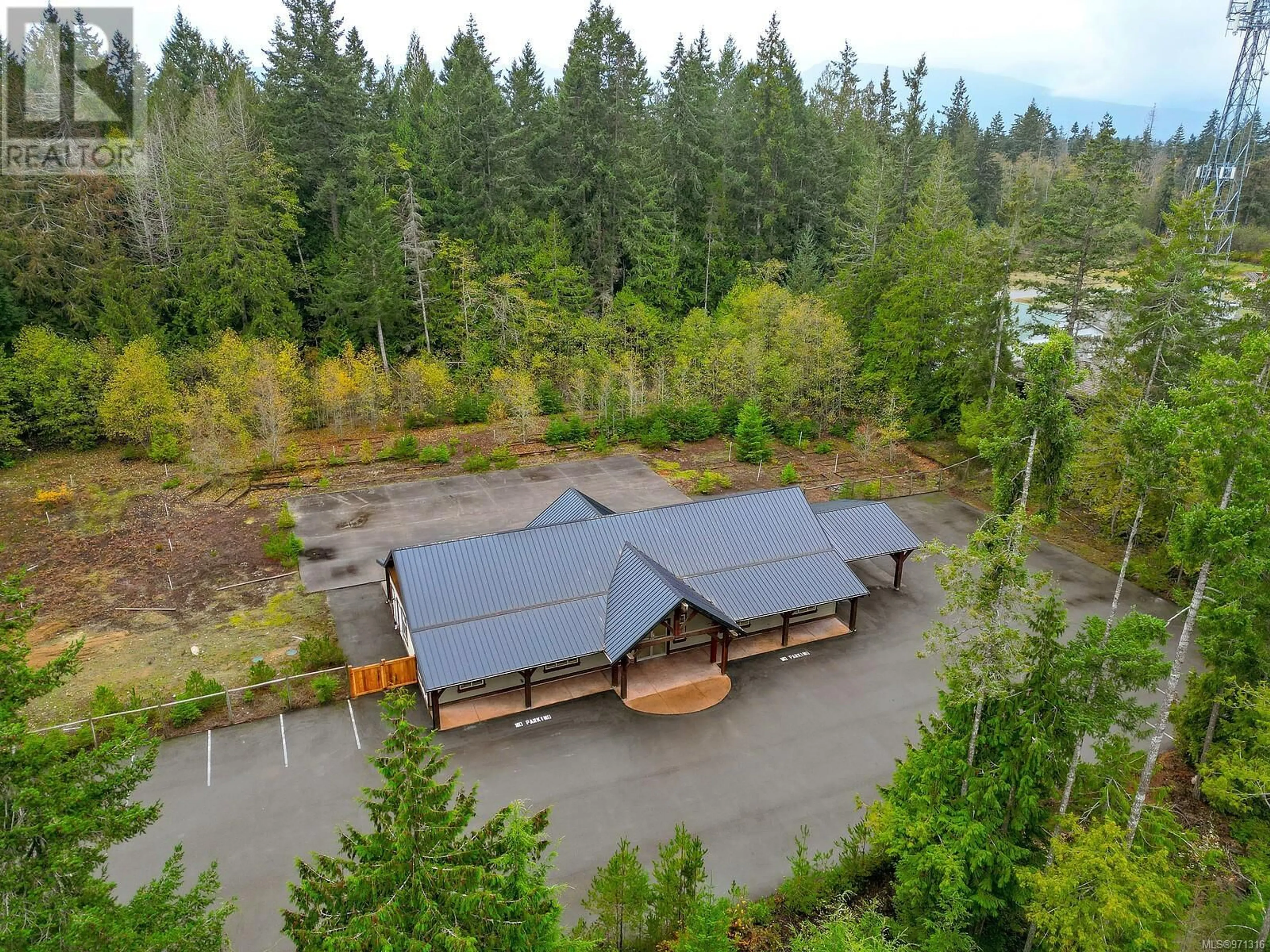 Patio, the front or back of building for 230 Rupert Rd E, Qualicum Beach British Columbia V9K1R3