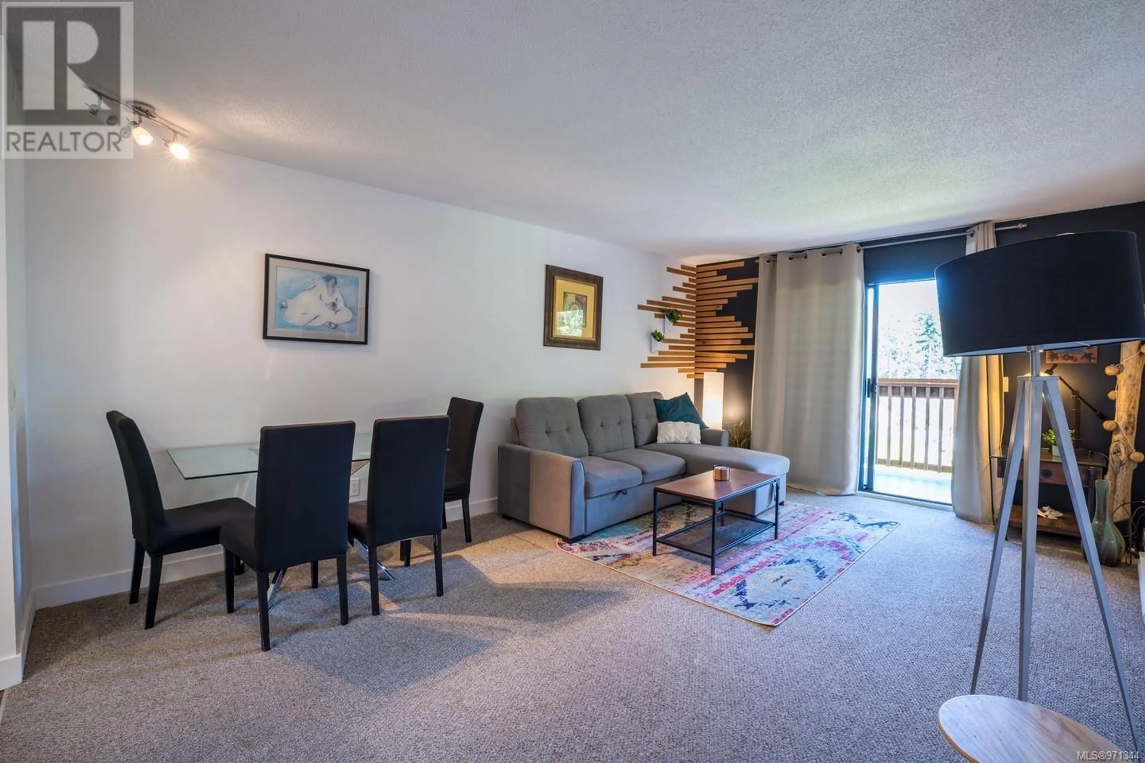 A pic of a room, carpet floors for 401 4724 Uplands Dr, Nanaimo British Columbia V9T4S8