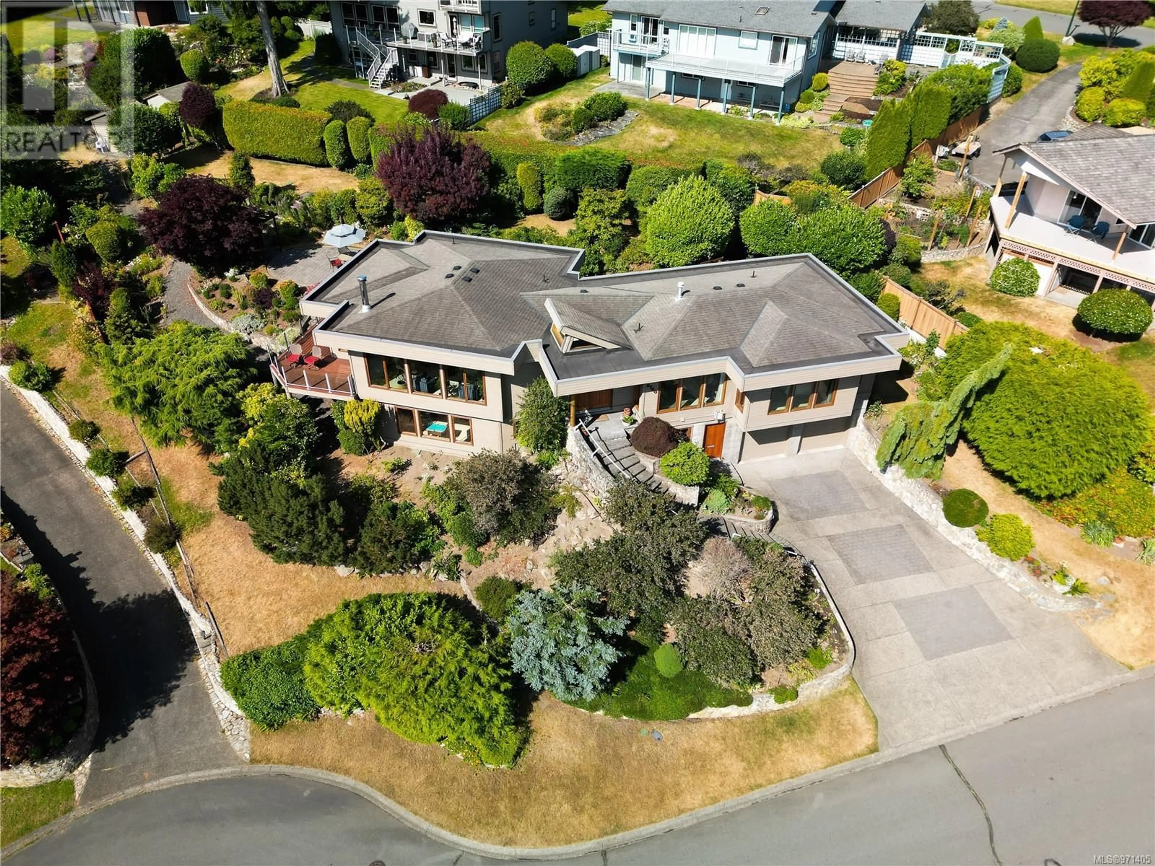 Frontside or backside of a home for 8760 Beaumaris Pl, North Saanich British Columbia V8L3Z6