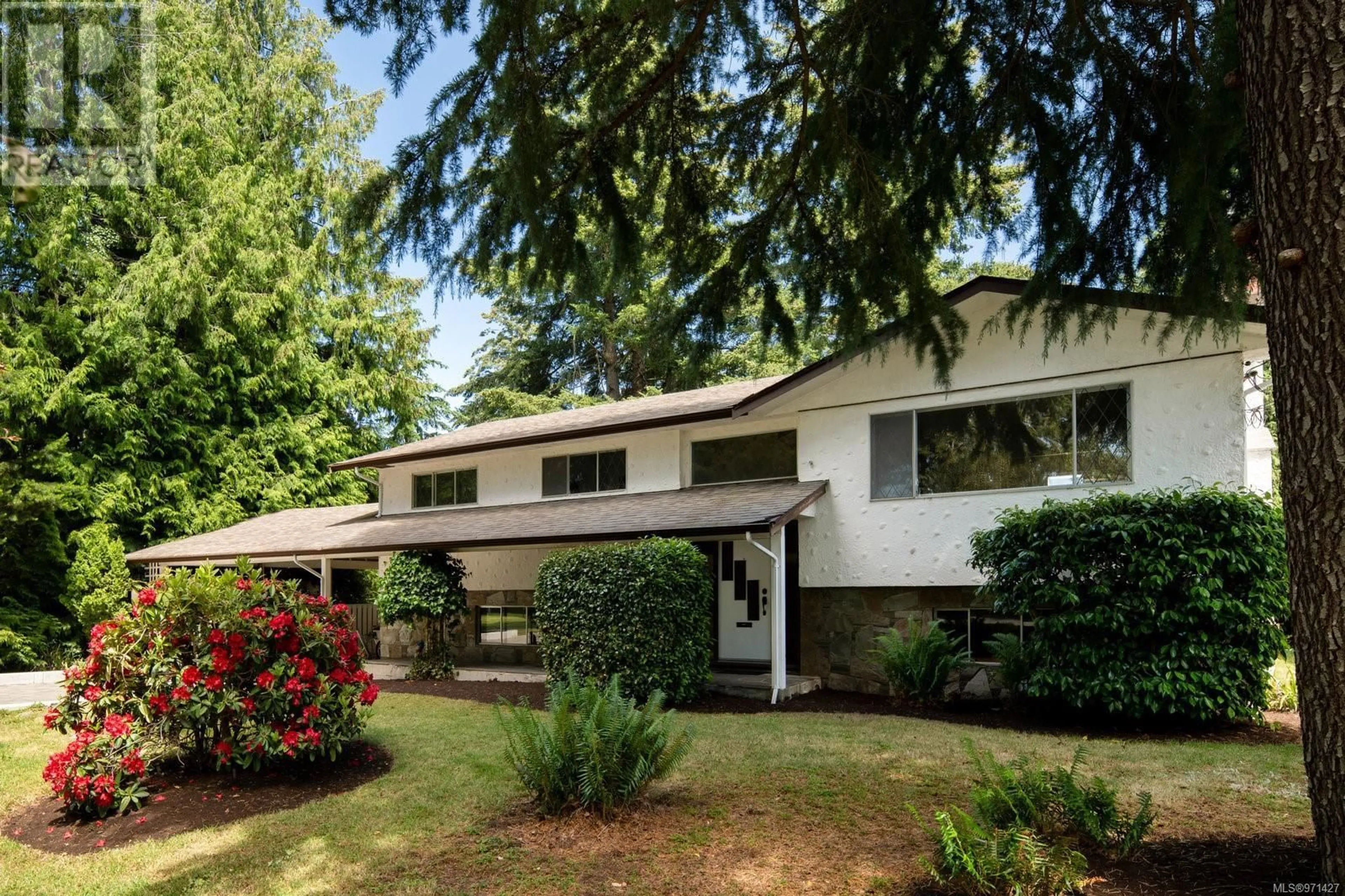 Frontside or backside of a home for 4937 Wesley Rd, Saanich British Columbia V8Y1Y8