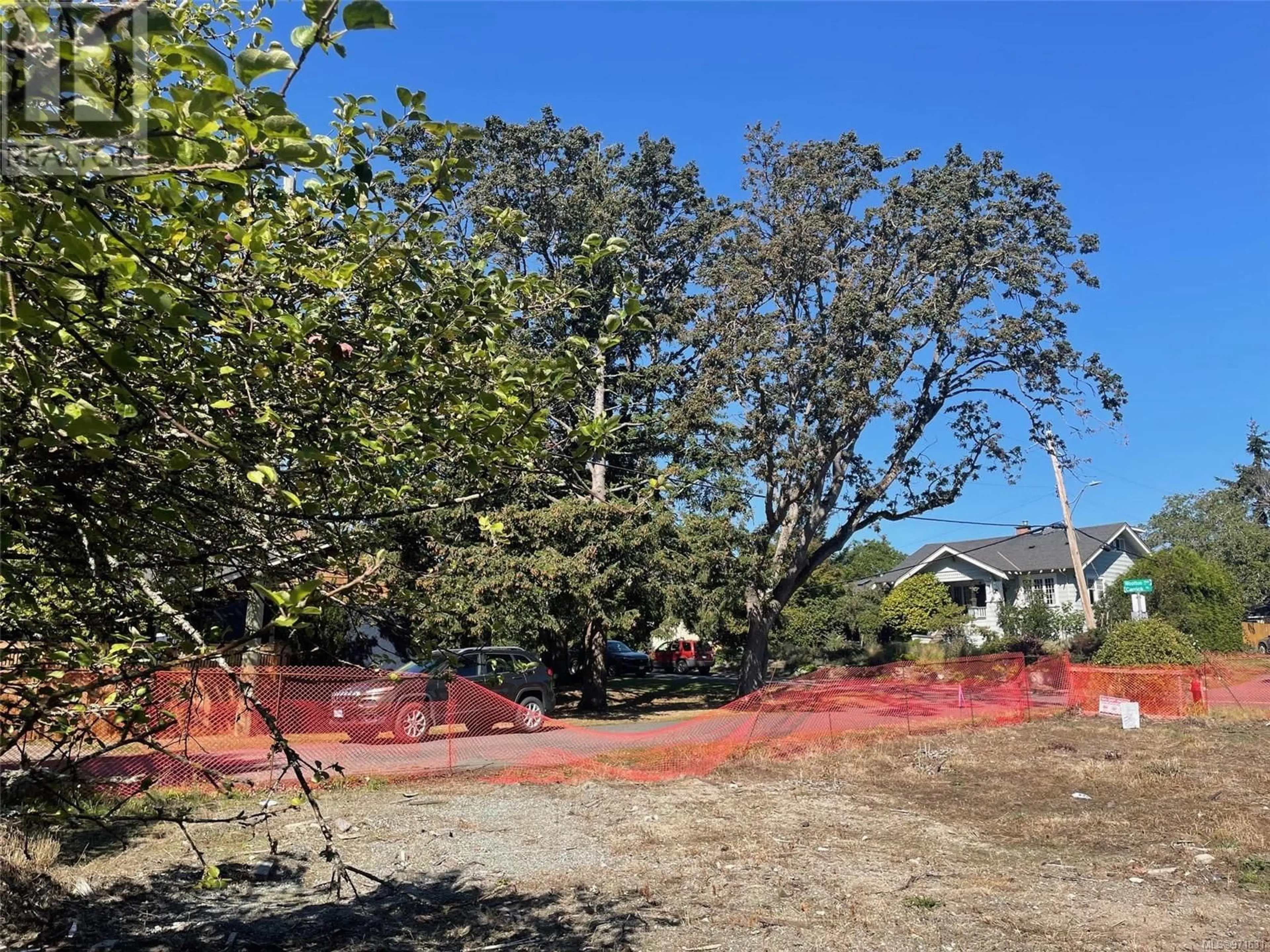 Frontside or backside of a home, the fenced backyard for 2501 Wootton Cres, Oak Bay British Columbia V8R5M7