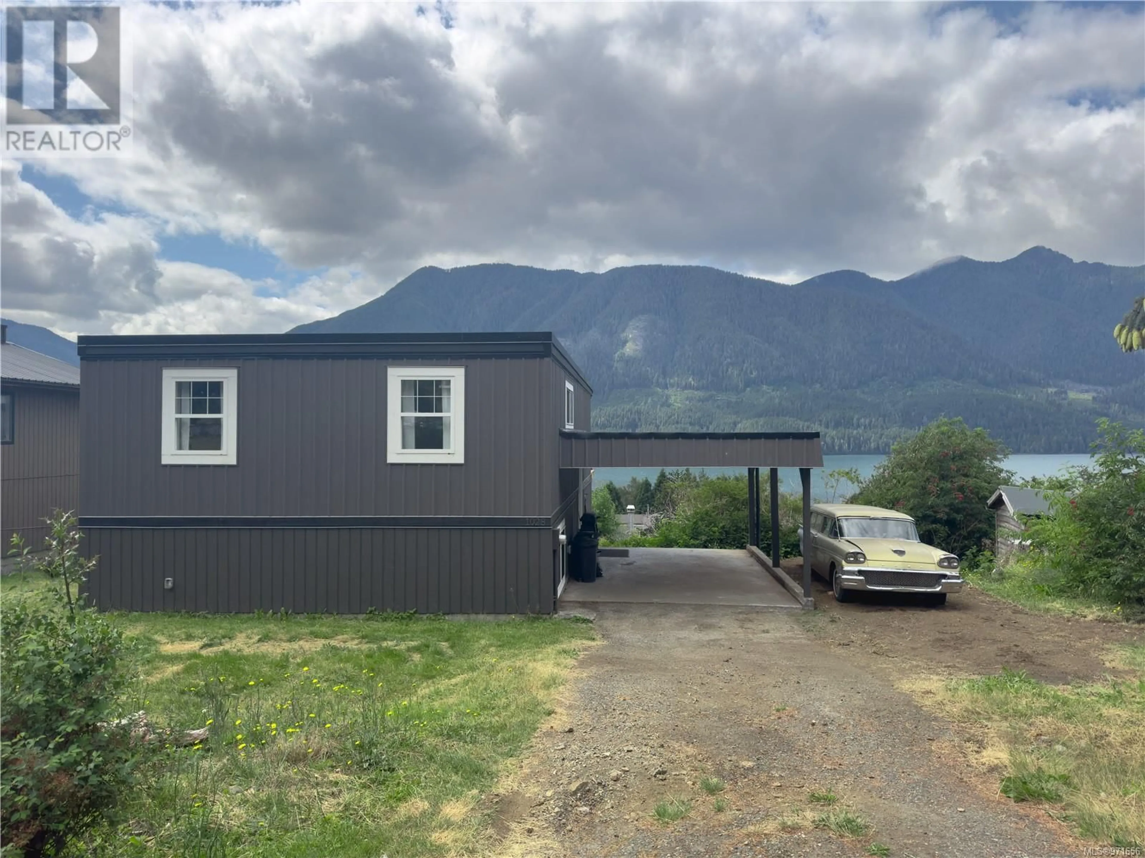 Frontside or backside of a home for 1028 Rupert Ave, Port Alice British Columbia V0N2N0