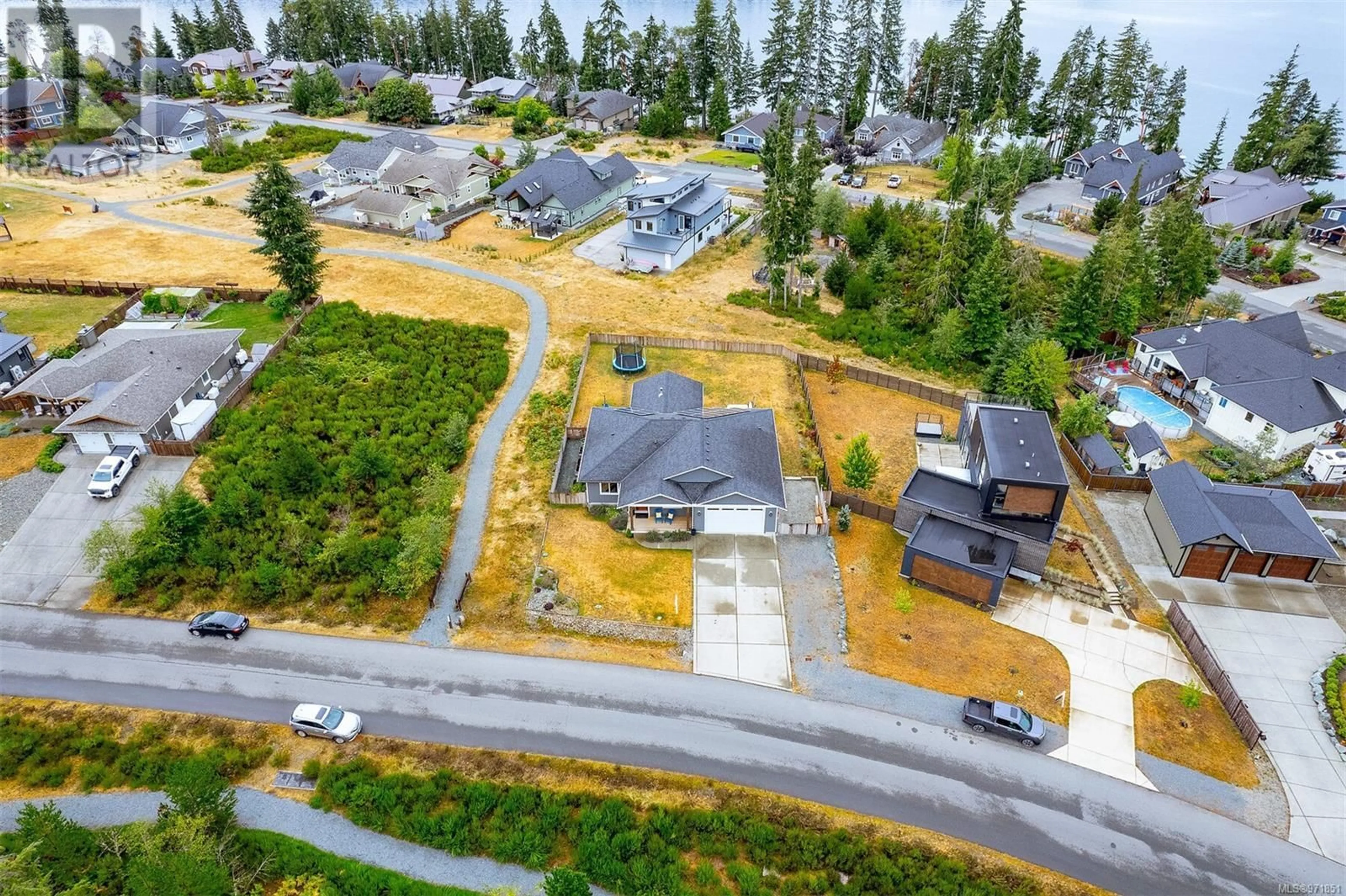 Frontside or backside of a home, the street view for 9444 Marble Bay Rd, Lake Cowichan British Columbia V0R2G1