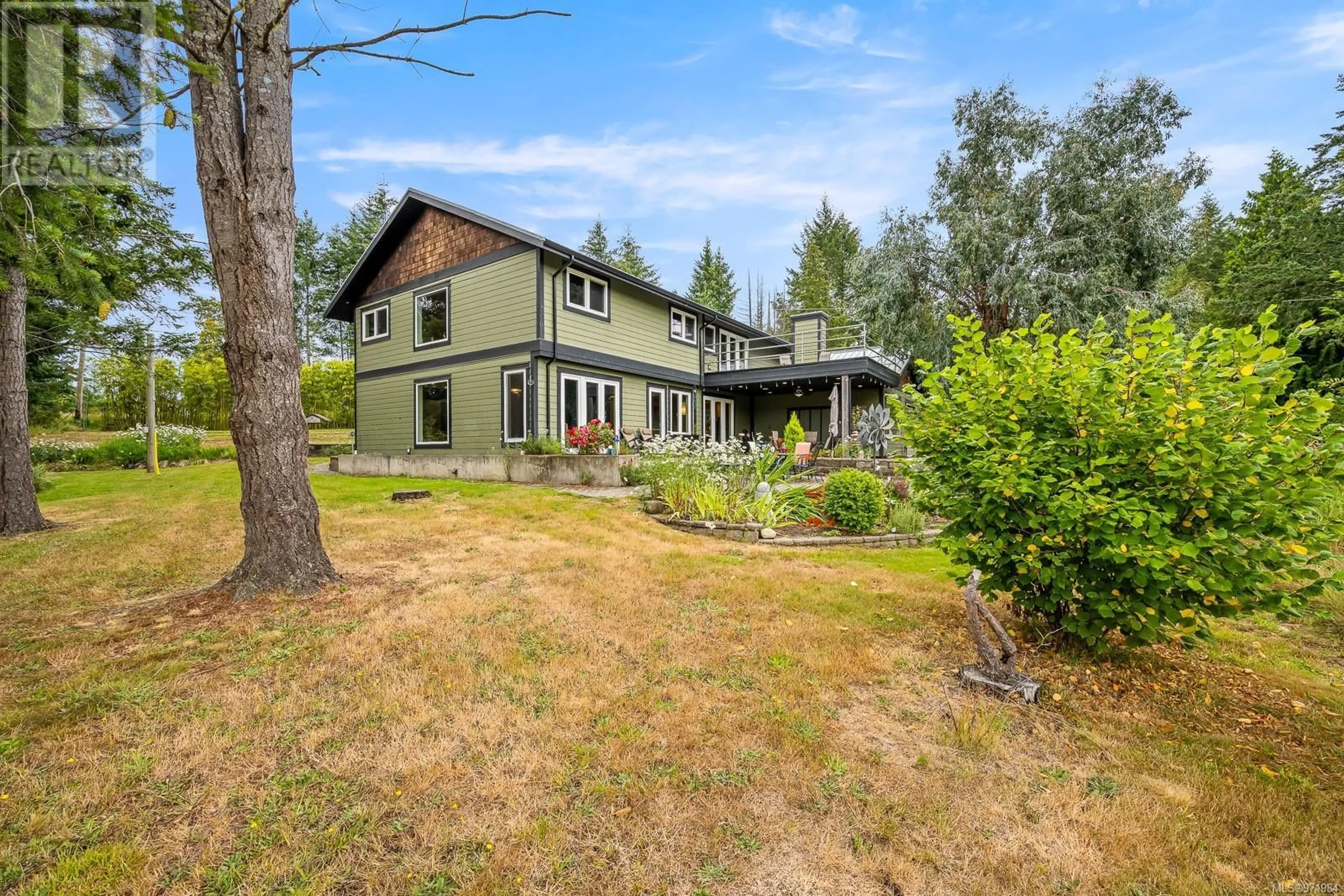 Frontside or backside of a home, cottage for 4101 Beaver Dr, Denman Island British Columbia V0R1T0