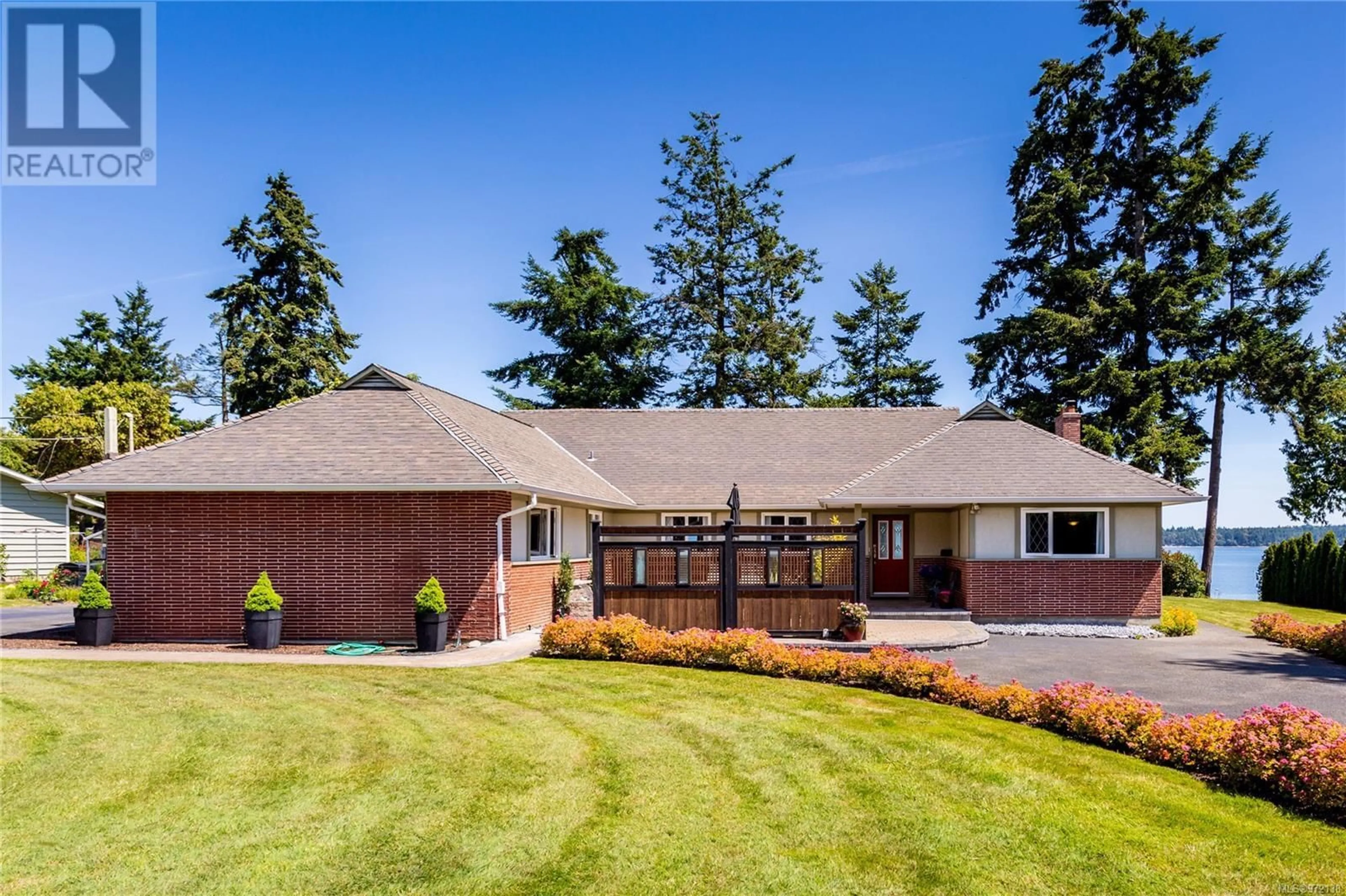 Frontside or backside of a home for 8025 Arthur Dr, Central Saanich British Columbia V8M1V4