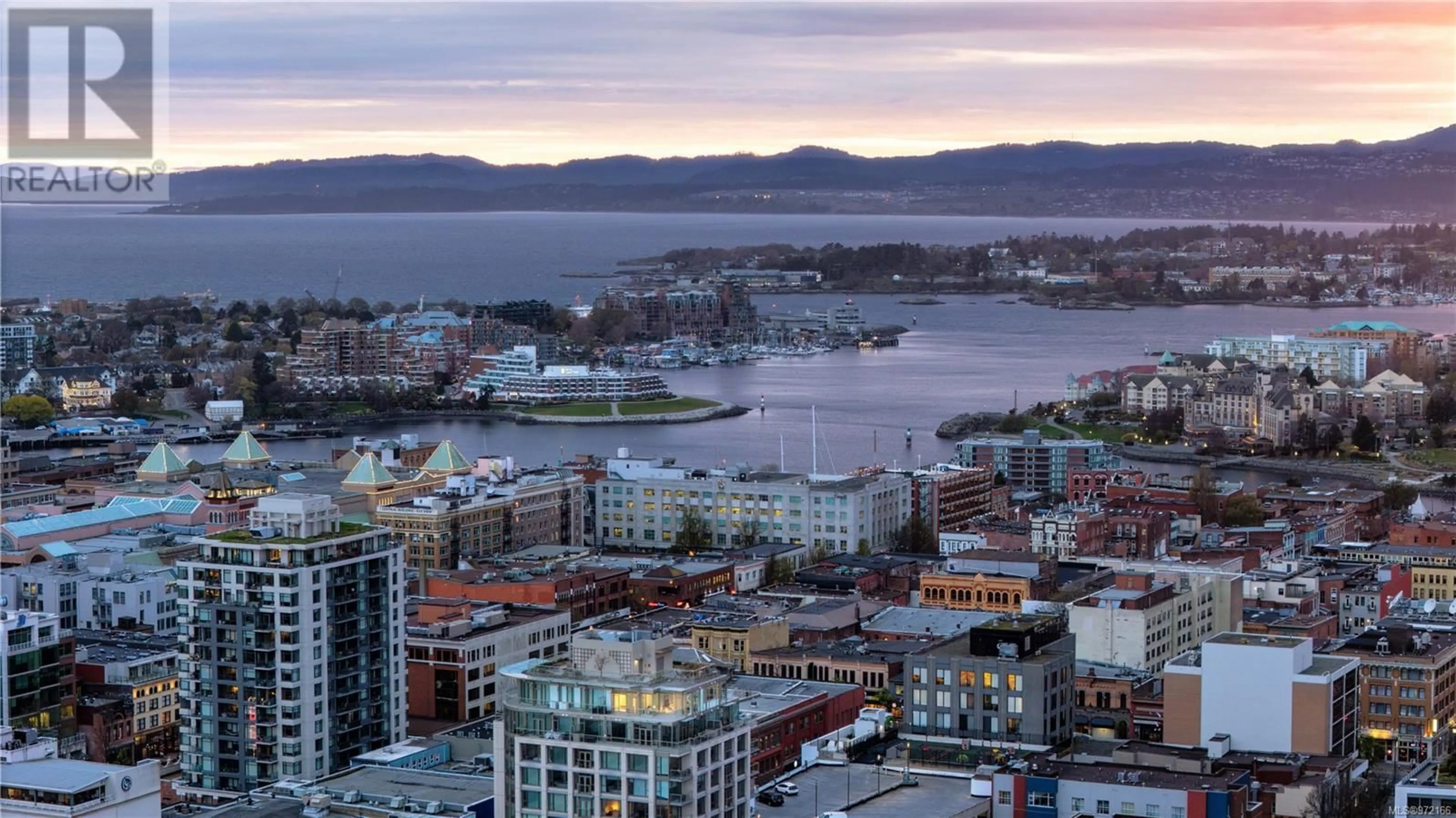 A pic from exterior of the house or condo, the view of city buildings for 1502 760 Johnson St, Victoria British Columbia V8W1N1