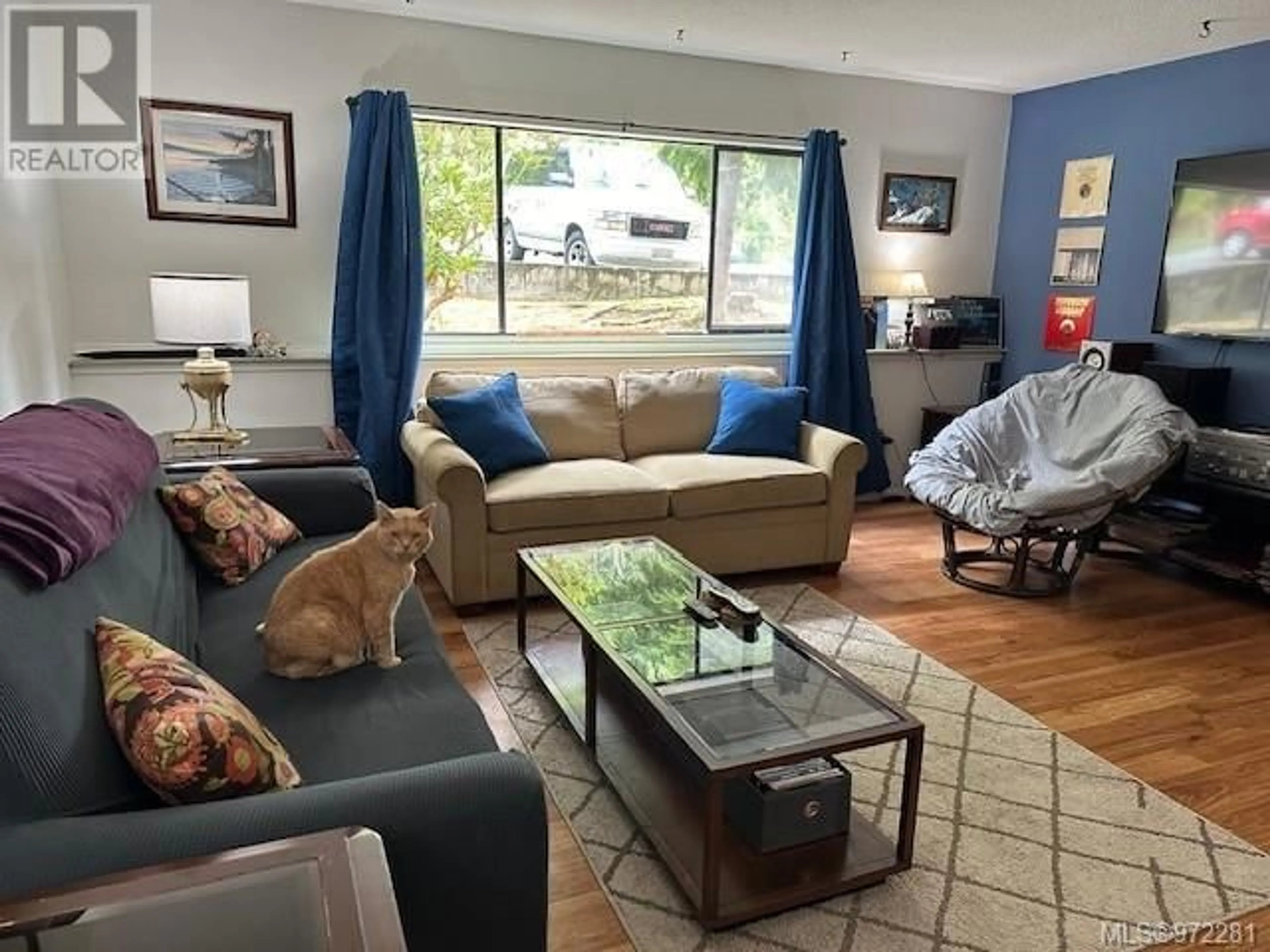 Living room, wood floors for 101 791 Marine Dr, Port Alice British Columbia V0N2P0