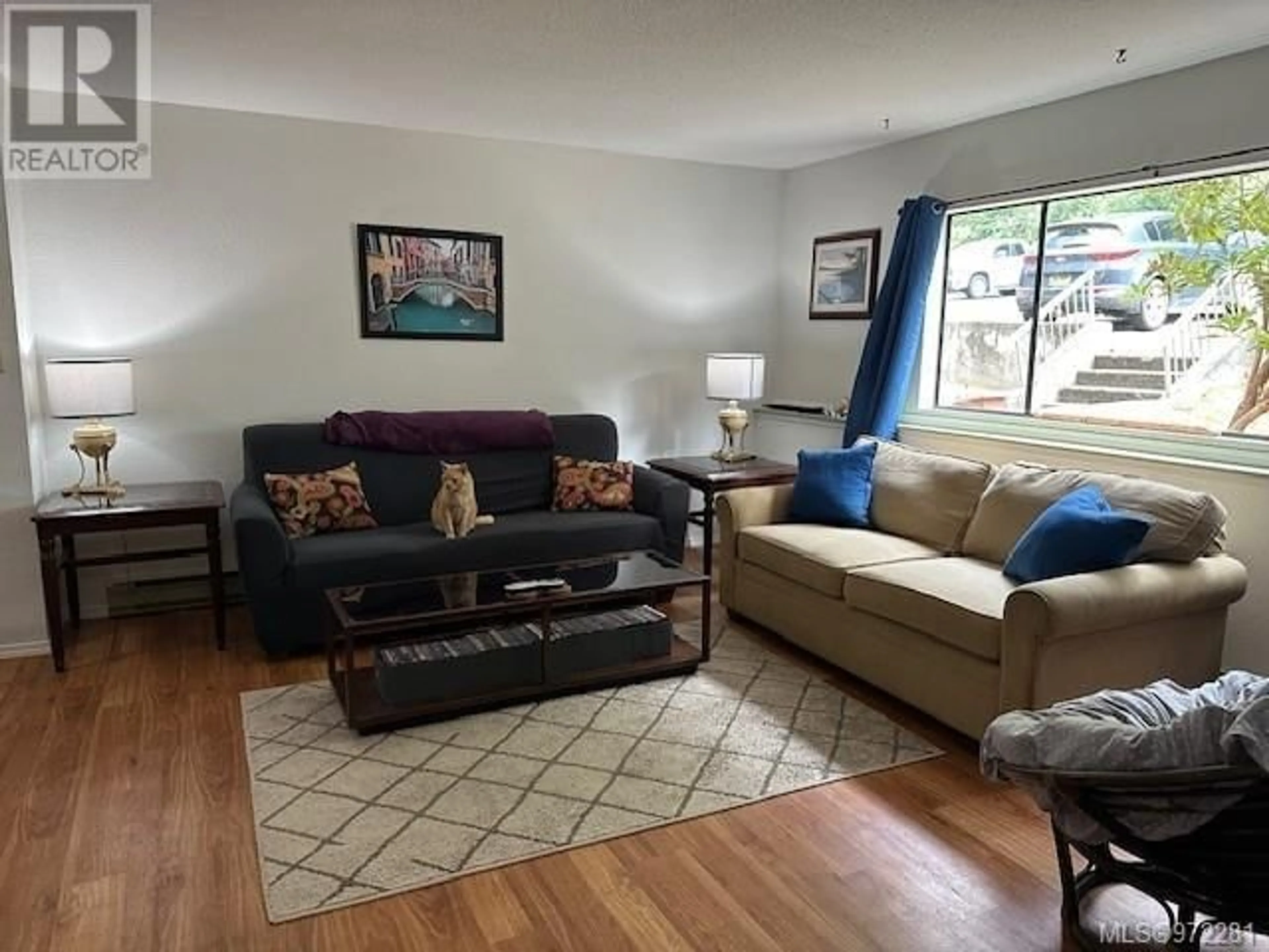 Living room, wood floors for 101 791 Marine Dr, Port Alice British Columbia V0N2P0