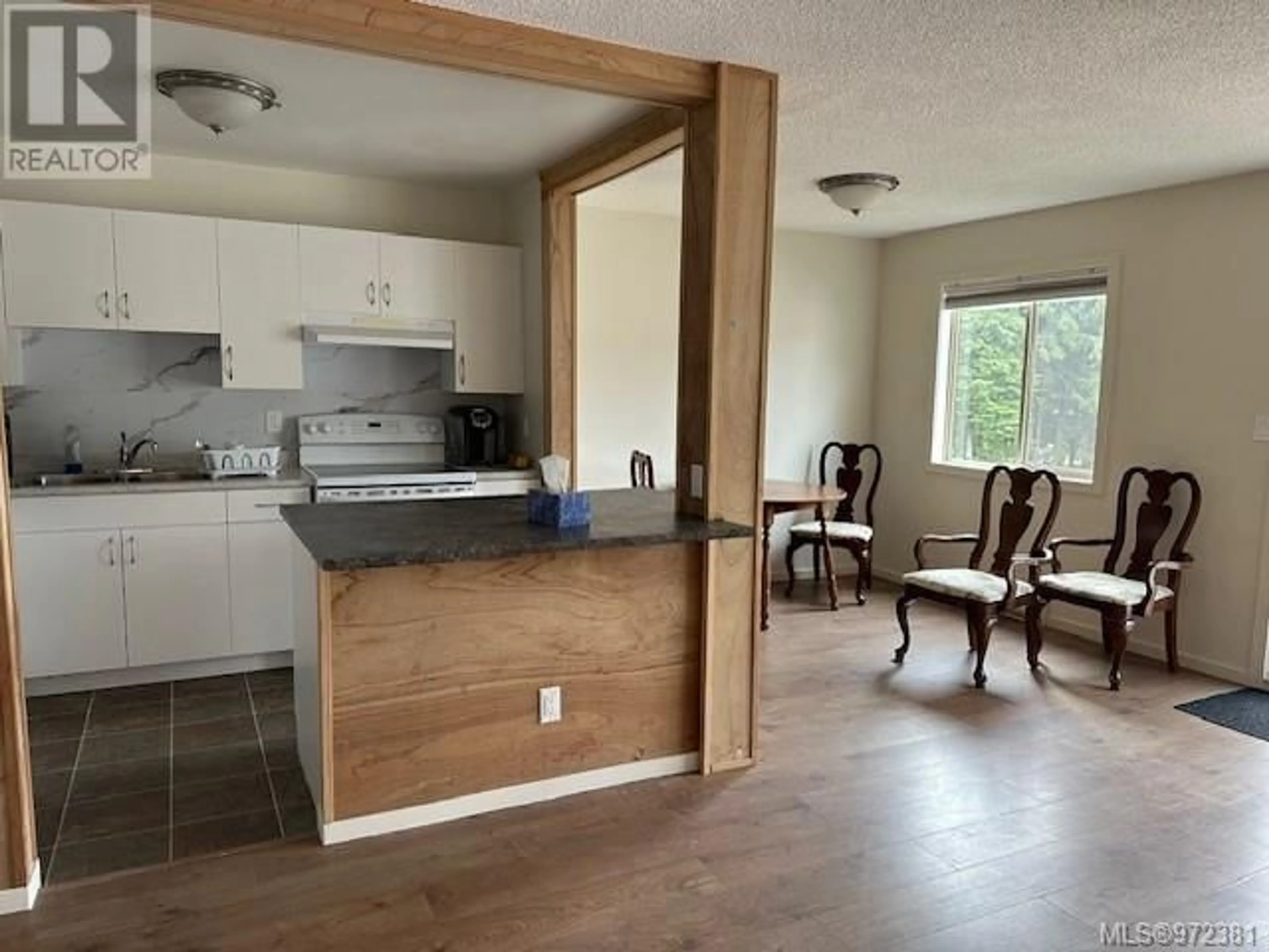 Open concept kitchen for 38 7077 Highland Dr, Port Hardy British Columbia V0N2P0