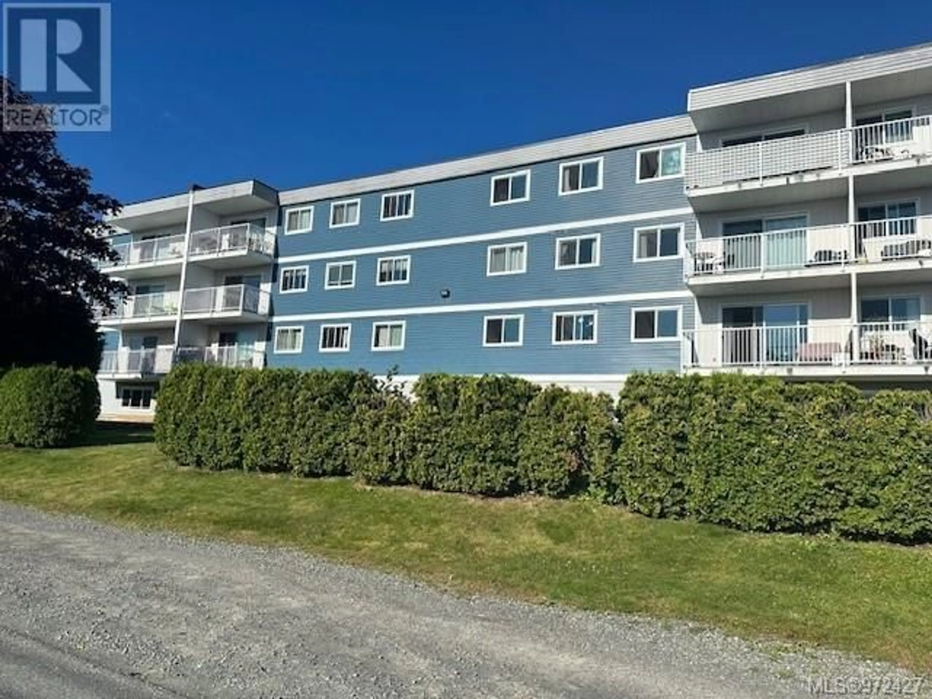 A pic from exterior of the house or condo, the front or back of building for 208 7450 Rupert St, Port Hardy British Columbia V0N2P0