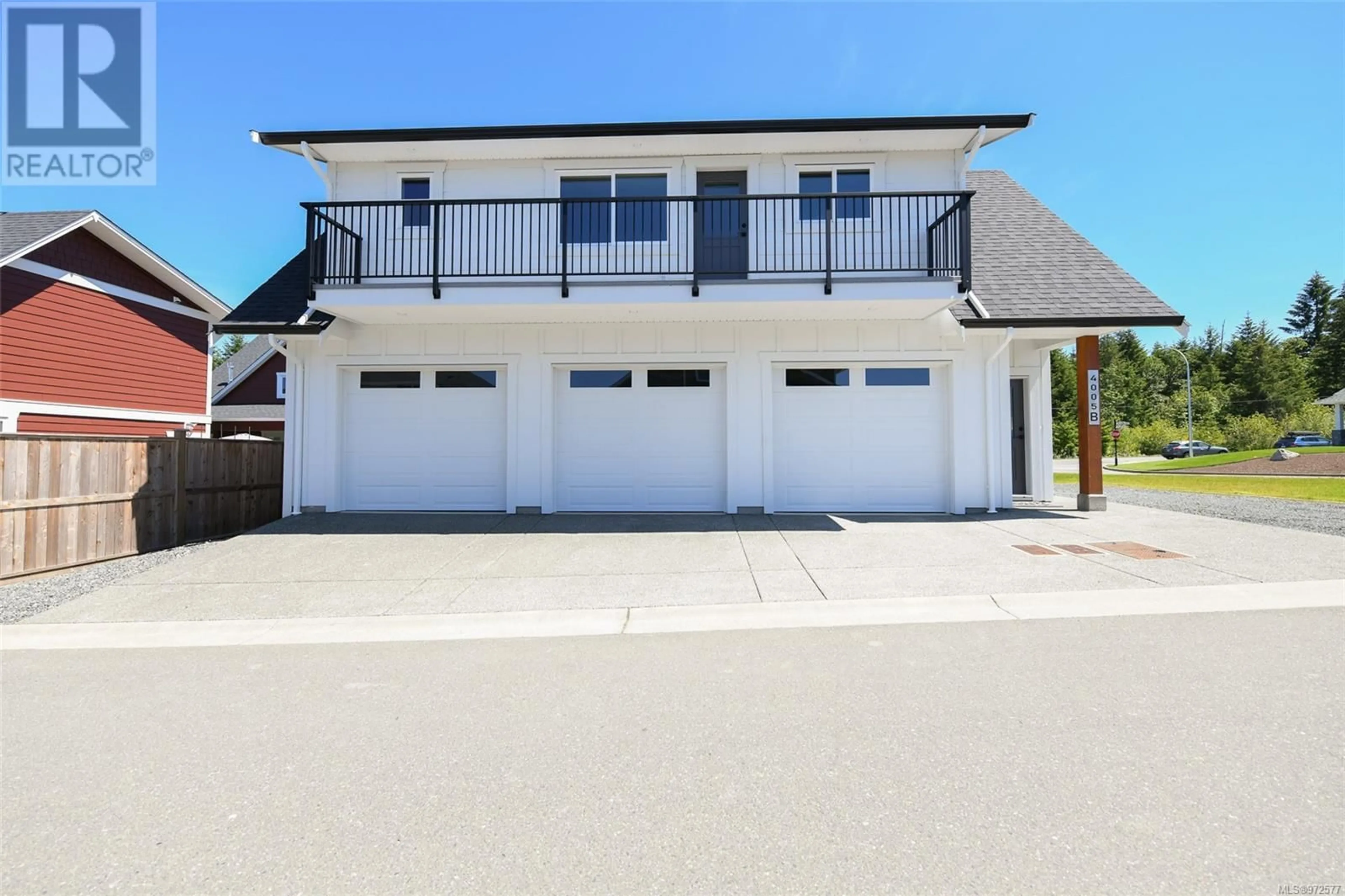 Frontside or backside of a home, the street view for 4005 Buckstone Rd, Courtenay British Columbia V9N0B4