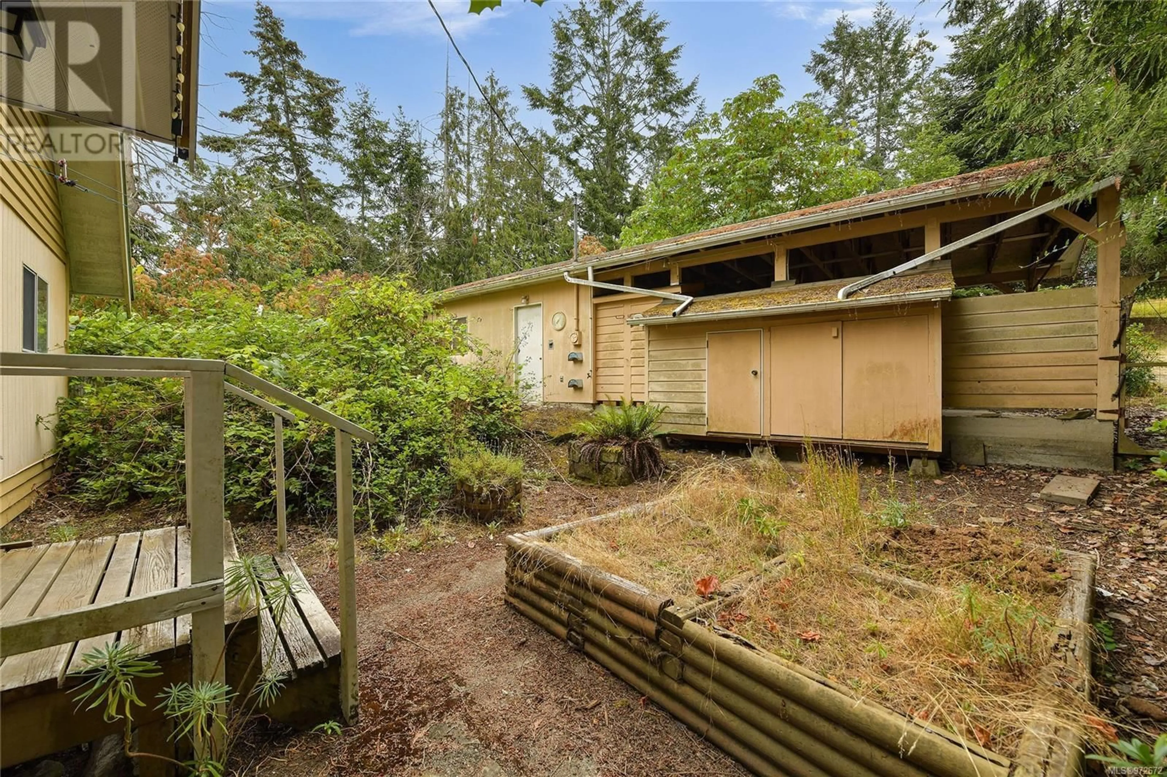 Patio, forest/trees view for 223 MARINERS WAY, Mayne Island British Columbia V0N2J2