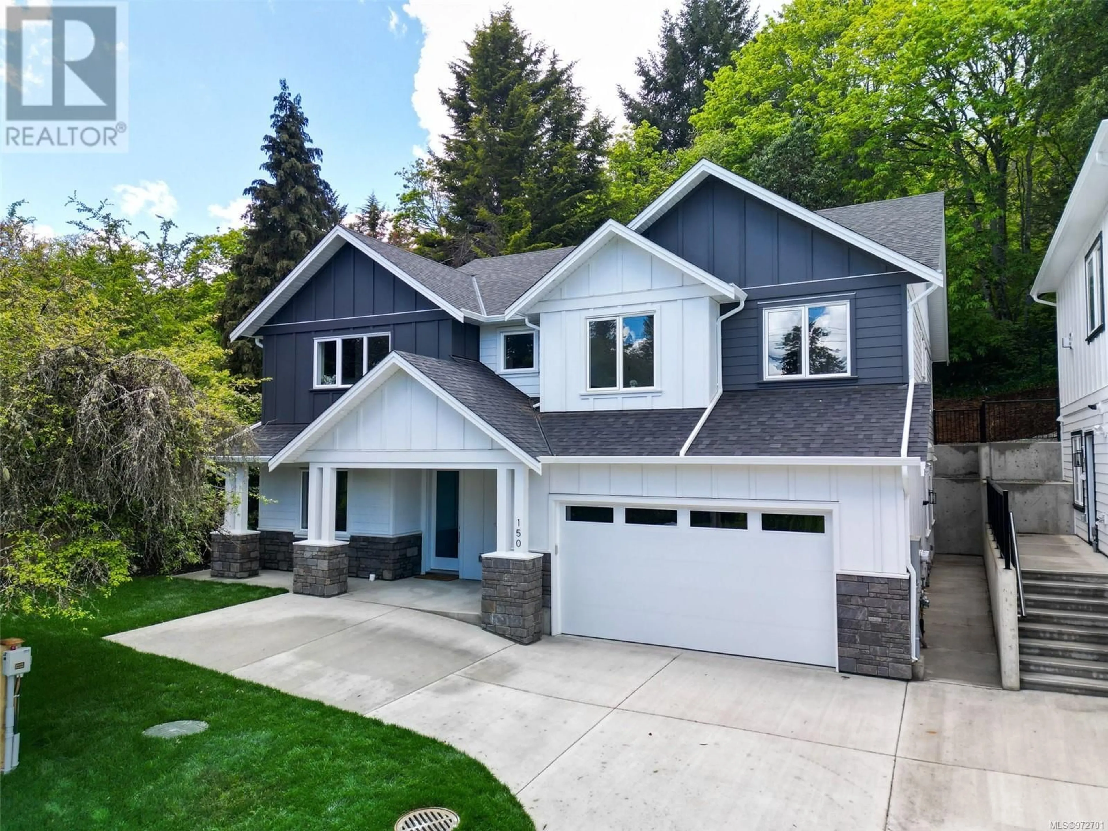 Home with vinyl exterior material, street for 150 Atkins Rd, View Royal British Columbia V9B6V4