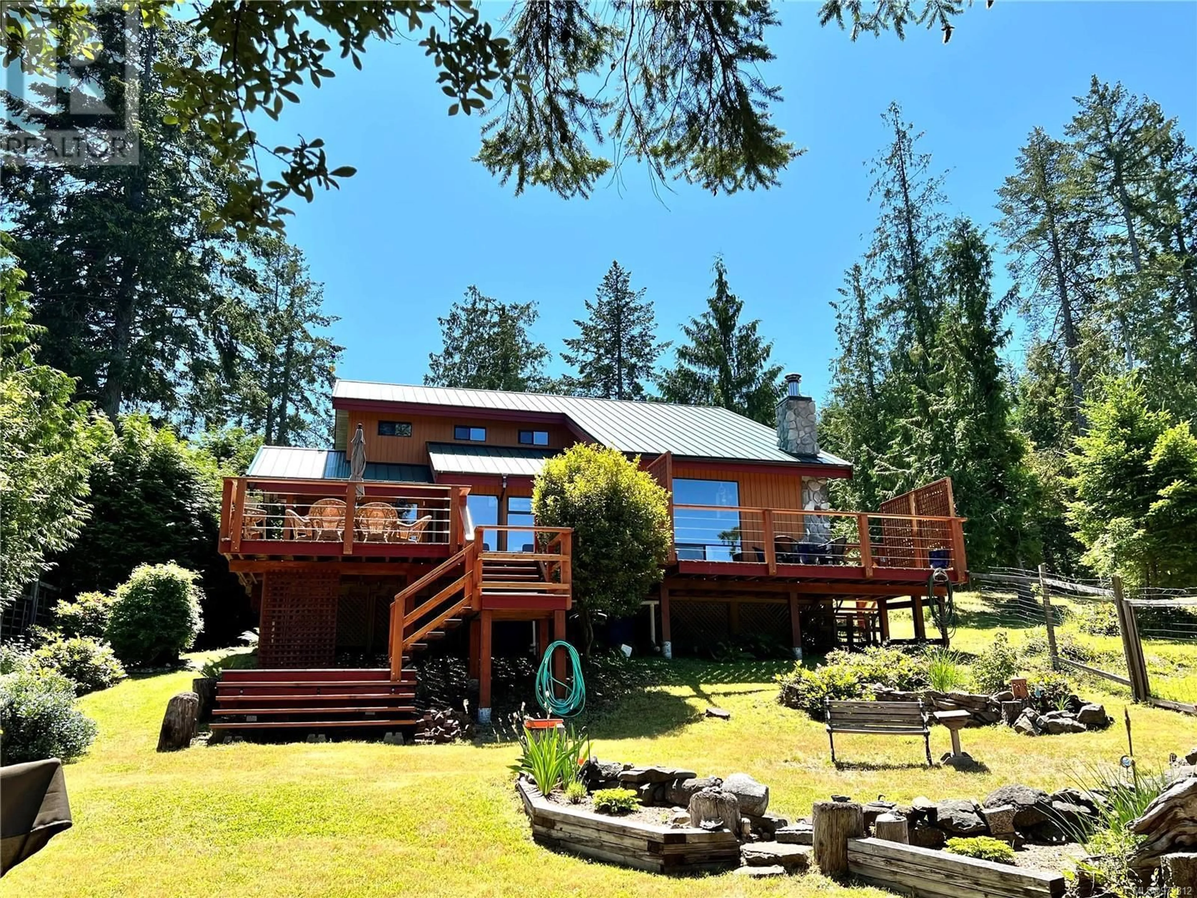 A pic from outside/outdoor area/front of a property/back of a property/a pic from drone, water/lake/river/ocean view for 576 Weathers Way, Mudge Island British Columbia V0R1X6